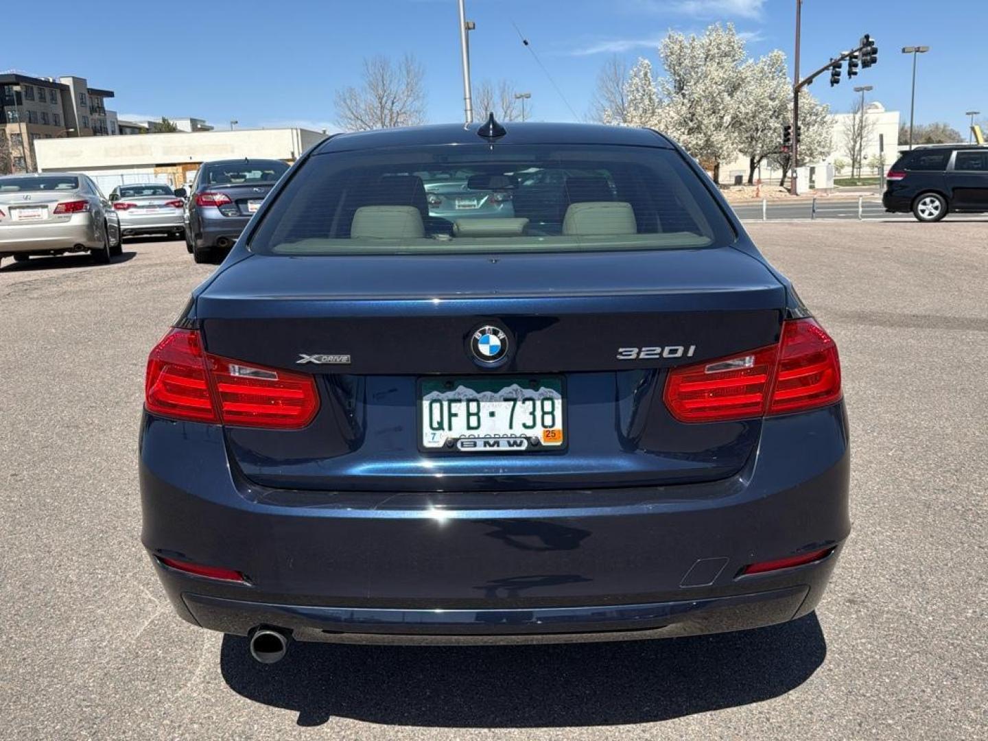 2014 BLUE /TAN BMW 3 series 320i XDrive (WBA3C3C59EK) with an 4 Cyl, 2.0L engine, Automatic transmission, located at 10890 W. Colfax Ave., Lakewood, CO, 80215, (303) 274-7692, 39.739914, -105.120132 - <b>Summary</b><br>Check out this low mile, All Wheel Drive BMW 3 Series. Loaded with heated leather seats, Sun Roof, Bluetoothe Audio and much more. One Owner, Clean Colorado tile with no accidents. This one has been very well maintained and tons of records on the FREE Carfax. Heated Leather Seats, - Photo#5