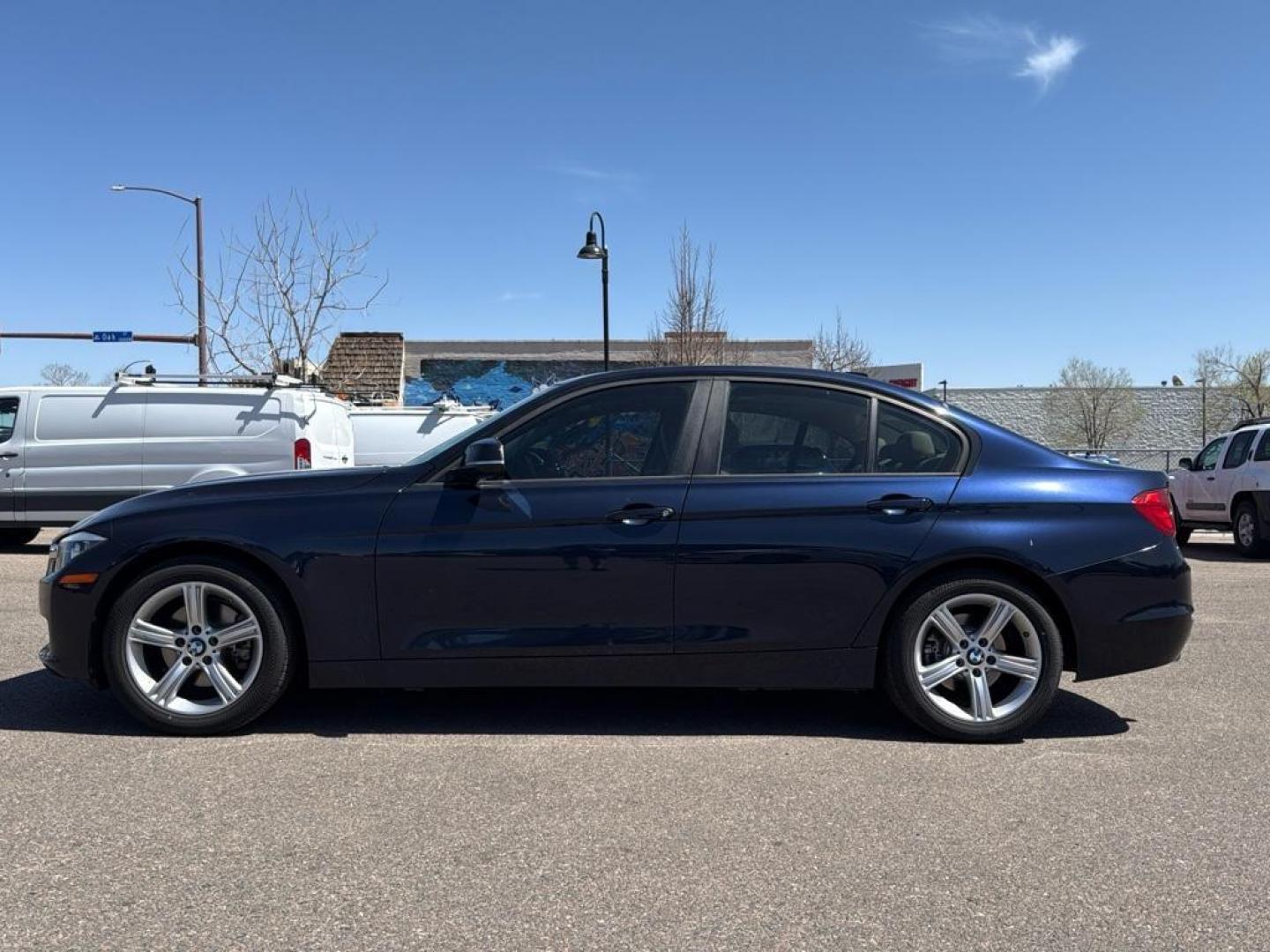 2014 BLUE /TAN BMW 3 series 320i XDrive (WBA3C3C59EK) with an 4 Cyl, 2.0L engine, Automatic transmission, located at 10890 W. Colfax Ave., Lakewood, CO, 80215, (303) 274-7692, 39.739914, -105.120132 - <b>Summary</b><br>Check out this low mile, All Wheel Drive BMW 3 Series. Loaded with heated leather seats, Sun Roof, Bluetoothe Audio and much more. One Owner, Clean Colorado tile with no accidents. This one has been very well maintained and tons of records on the FREE Carfax. Heated Leather Seats, - Photo#8