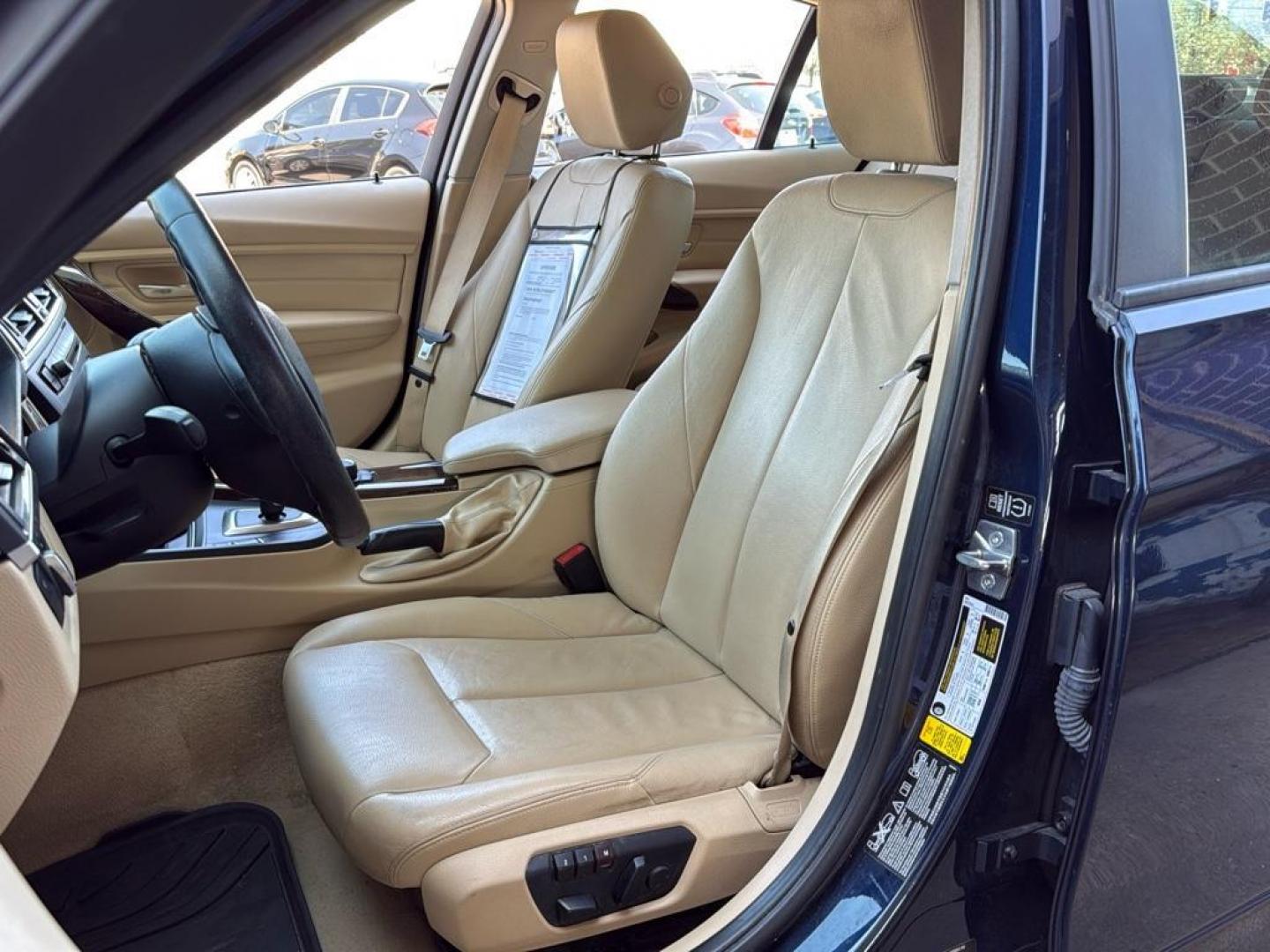 2014 BLUE /TAN BMW 3 series 320i XDrive (WBA3C3C59EK) with an 4 Cyl, 2.0L engine, Automatic transmission, located at 10890 W. Colfax Ave., Lakewood, CO, 80215, (303) 274-7692, 39.739914, -105.120132 - <b>Summary</b><br>Check out this low mile, All Wheel Drive BMW 3 Series. Loaded with heated leather seats, Sun Roof, Bluetoothe Audio and much more. One Owner, Clean Colorado tile with no accidents. This one has been very well maintained and tons of records on the FREE Carfax. Heated Leather Seats, - Photo#14