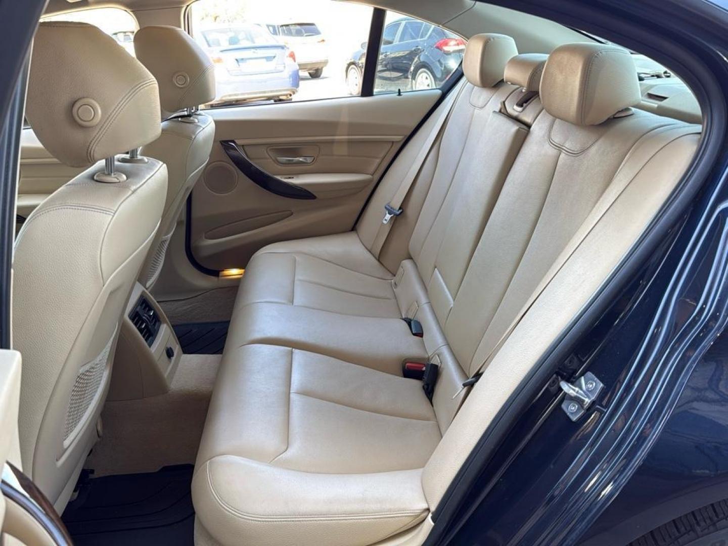 2014 BLUE /TAN BMW 3 series 320i XDrive (WBA3C3C59EK) with an 4 Cyl, 2.0L engine, Automatic transmission, located at 10890 W. Colfax Ave., Lakewood, CO, 80215, (303) 274-7692, 39.739914, -105.120132 - <b>Summary</b><br>Check out this low mile, All Wheel Drive BMW 3 Series. Loaded with heated leather seats, Sun Roof, Bluetoothe Audio and much more. One Owner, Clean Colorado tile with no accidents. This one has been very well maintained and tons of records on the FREE Carfax. Heated Leather Seats, - Photo#18