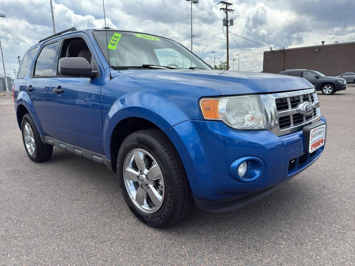 2011 BLUE Ford Escape XLT (1FMCU9DG8BK) with an V6, 3.0L engine, Automatic transmission, located at 10890 W. Colfax Ave., Lakewood, CO, 80215, (303) 274-7692, 39.739914, -105.120132 - Discover the reliability and versatility of the 2011 Ford Escape XLT, a compact SUV designed to meet diverse driving needs. This model features a robust 4WD system, perfect for tackling various road conditions with ease and confidence. Under the hood, you'll find a powerful V6, 3.0L engine that deli - Photo#2