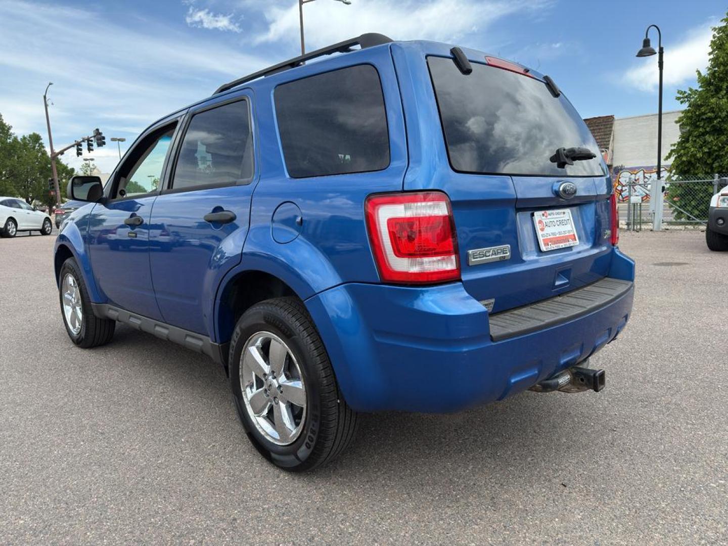 2011 BLUE Ford Escape XLT (1FMCU9DG8BK) with an V6, 3.0L engine, Automatic transmission, located at 10890 W. Colfax Ave., Lakewood, CO, 80215, (303) 274-7692, 39.739914, -105.120132 - Discover the reliability and versatility of the 2011 Ford Escape XLT, a compact SUV designed to meet diverse driving needs. This model features a robust 4WD system, perfect for tackling various road conditions with ease and confidence. Under the hood, you'll find a powerful V6, 3.0L engine that deli - Photo#6