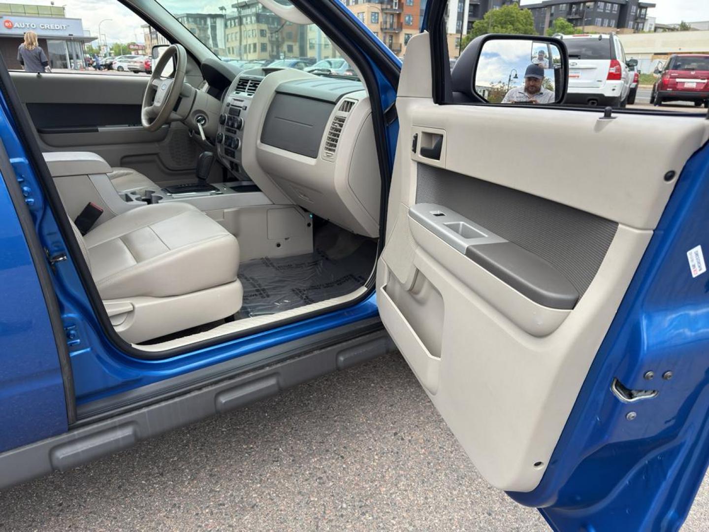 2011 BLUE Ford Escape XLT (1FMCU9DG8BK) with an V6, 3.0L engine, Automatic transmission, located at 10890 W. Colfax Ave., Lakewood, CO, 80215, (303) 274-7692, 39.739914, -105.120132 - Discover the reliability and versatility of the 2011 Ford Escape XLT, a compact SUV designed to meet diverse driving needs. This model features a robust 4WD system, perfect for tackling various road conditions with ease and confidence. Under the hood, you'll find a powerful V6, 3.0L engine that deli - Photo#8
