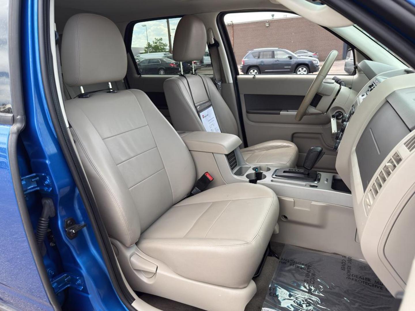 2011 BLUE Ford Escape XLT (1FMCU9DG8BK) with an V6, 3.0L engine, Automatic transmission, located at 10890 W. Colfax Ave., Lakewood, CO, 80215, (303) 274-7692, 39.739914, -105.120132 - Discover the reliability and versatility of the 2011 Ford Escape XLT, a compact SUV designed to meet diverse driving needs. This model features a robust 4WD system, perfect for tackling various road conditions with ease and confidence. Under the hood, you'll find a powerful V6, 3.0L engine that deli - Photo#9