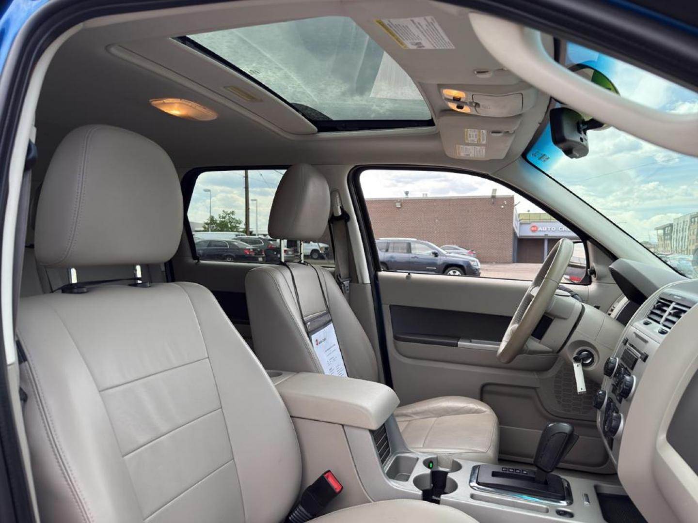 2011 BLUE Ford Escape XLT (1FMCU9DG8BK) with an V6, 3.0L engine, Automatic transmission, located at 10890 W. Colfax Ave., Lakewood, CO, 80215, (303) 274-7692, 39.739914, -105.120132 - Discover the reliability and versatility of the 2011 Ford Escape XLT, a compact SUV designed to meet diverse driving needs. This model features a robust 4WD system, perfect for tackling various road conditions with ease and confidence. Under the hood, you'll find a powerful V6, 3.0L engine that deli - Photo#10