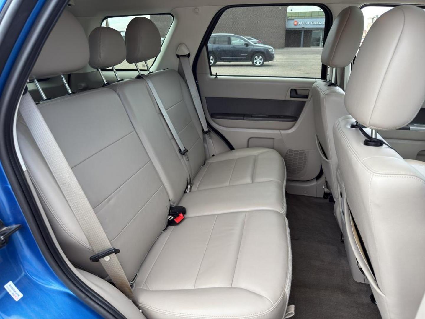2011 BLUE Ford Escape XLT (1FMCU9DG8BK) with an V6, 3.0L engine, Automatic transmission, located at 10890 W. Colfax Ave., Lakewood, CO, 80215, (303) 274-7692, 39.739914, -105.120132 - Discover the reliability and versatility of the 2011 Ford Escape XLT, a compact SUV designed to meet diverse driving needs. This model features a robust 4WD system, perfect for tackling various road conditions with ease and confidence. Under the hood, you'll find a powerful V6, 3.0L engine that deli - Photo#12
