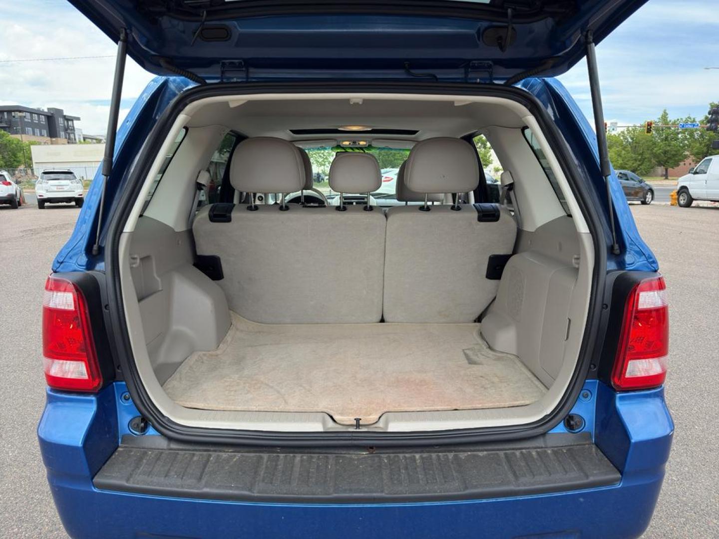 2011 BLUE Ford Escape XLT (1FMCU9DG8BK) with an V6, 3.0L engine, Automatic transmission, located at 10890 W. Colfax Ave., Lakewood, CO, 80215, (303) 274-7692, 39.739914, -105.120132 - Discover the reliability and versatility of the 2011 Ford Escape XLT, a compact SUV designed to meet diverse driving needs. This model features a robust 4WD system, perfect for tackling various road conditions with ease and confidence. Under the hood, you'll find a powerful V6, 3.0L engine that deli - Photo#13