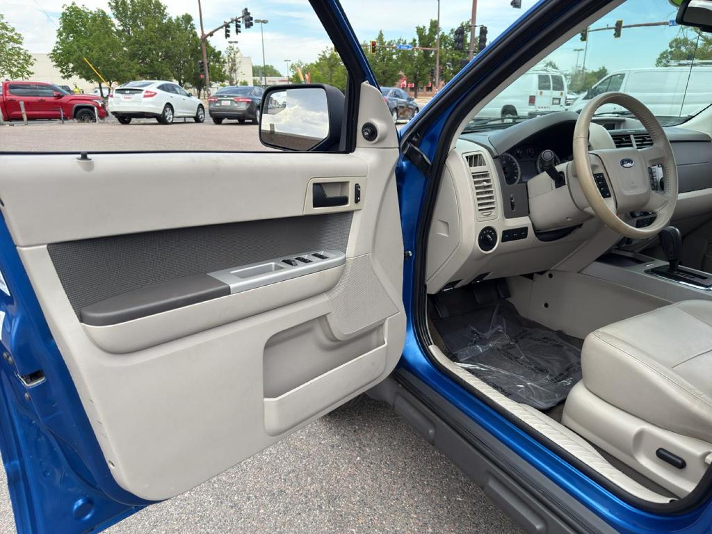 2011 BLUE Ford Escape XLT (1FMCU9DG8BK) with an V6, 3.0L engine, Automatic transmission, located at 10890 W. Colfax Ave., Lakewood, CO, 80215, (303) 274-7692, 39.739914, -105.120132 - Discover the reliability and versatility of the 2011 Ford Escape XLT, a compact SUV designed to meet diverse driving needs. This model features a robust 4WD system, perfect for tackling various road conditions with ease and confidence. Under the hood, you'll find a powerful V6, 3.0L engine that deli - Photo#16