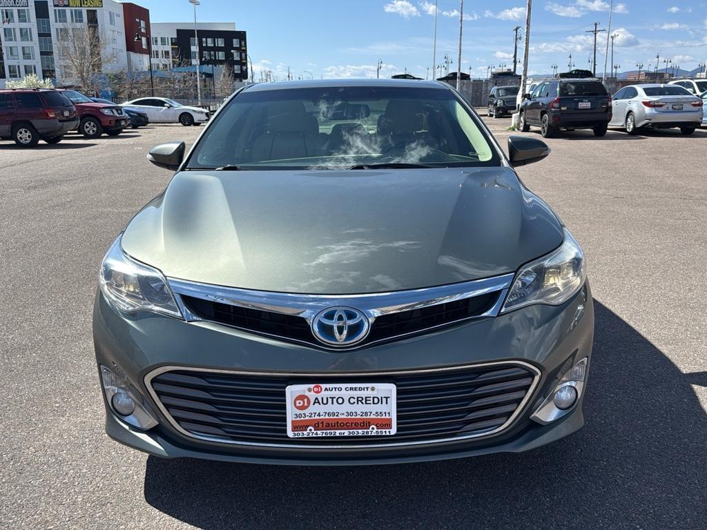 2013 GREEN Toyota Avalon Hybrid XLE TOURING (4T1BD1EB4DU) with an 4 Cyl, 2.5L engine, Automatic transmission, located at 10890 W. Colfax Ave., Lakewood, CO, 80215, (303) 274-7692, 39.739914, -105.120132 - For sale: a meticulously maintained 2013 Toyota Avalon Hybrid XLE Touring that combines luxury, efficiency, and reliability. This sophisticated sedan features a robust 4-cylinder, 2.5L engine paired with front-wheel drive, offering an impressive blend of power and fuel economy. The Avalons hybrid te - Photo#1