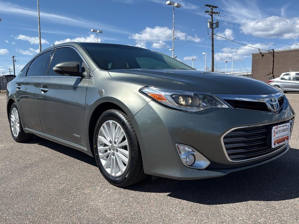 2013 GREEN Toyota Avalon Hybrid XLE TOURING (4T1BD1EB4DU) with an 4 Cyl, 2.5L engine, Automatic transmission, located at 10890 W. Colfax Ave., Lakewood, CO, 80215, (303) 274-7692, 39.739914, -105.120132 - For sale: a meticulously maintained 2013 Toyota Avalon Hybrid XLE Touring that combines luxury, efficiency, and reliability. This sophisticated sedan features a robust 4-cylinder, 2.5L engine paired with front-wheel drive, offering an impressive blend of power and fuel economy. The Avalons hybrid te - Photo#2