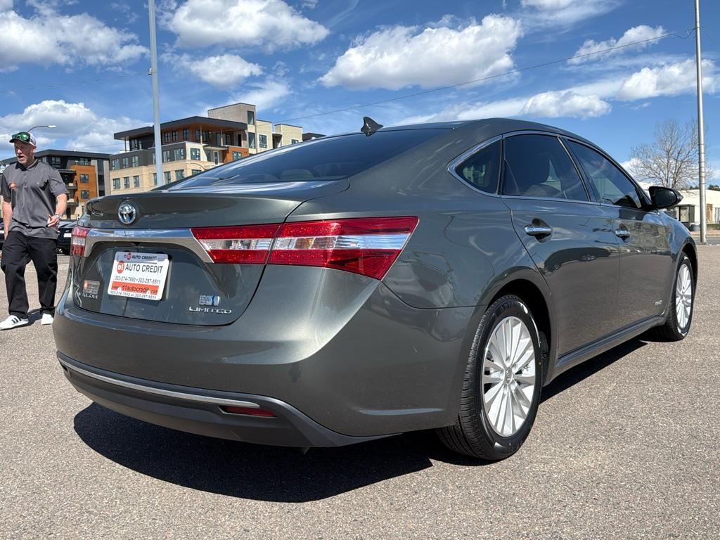 2013 GREEN Toyota Avalon Hybrid XLE TOURING (4T1BD1EB4DU) with an 4 Cyl, 2.5L engine, Automatic transmission, located at 10890 W. Colfax Ave., Lakewood, CO, 80215, (303) 274-7692, 39.739914, -105.120132 - For sale: a meticulously maintained 2013 Toyota Avalon Hybrid XLE Touring that combines luxury, efficiency, and reliability. This sophisticated sedan features a robust 4-cylinder, 2.5L engine paired with front-wheel drive, offering an impressive blend of power and fuel economy. The Avalons hybrid te - Photo#4