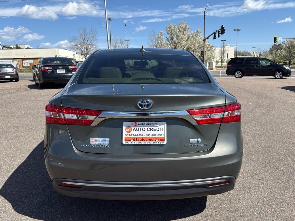 2013 GREEN Toyota Avalon Hybrid XLE TOURING (4T1BD1EB4DU) with an 4 Cyl, 2.5L engine, Automatic transmission, located at 10890 W. Colfax Ave., Lakewood, CO, 80215, (303) 274-7692, 39.739914, -105.120132 - For sale: a meticulously maintained 2013 Toyota Avalon Hybrid XLE Touring that combines luxury, efficiency, and reliability. This sophisticated sedan features a robust 4-cylinder, 2.5L engine paired with front-wheel drive, offering an impressive blend of power and fuel economy. The Avalons hybrid te - Photo#5