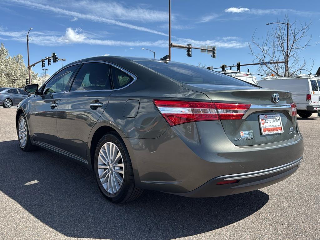 2013 GREEN Toyota Avalon Hybrid XLE TOURING (4T1BD1EB4DU) with an 4 Cyl, 2.5L engine, Automatic transmission, located at 10890 W. Colfax Ave., Lakewood, CO, 80215, (303) 274-7692, 39.739914, -105.120132 - For sale: a meticulously maintained 2013 Toyota Avalon Hybrid XLE Touring that combines luxury, efficiency, and reliability. This sophisticated sedan features a robust 4-cylinder, 2.5L engine paired with front-wheel drive, offering an impressive blend of power and fuel economy. The Avalons hybrid te - Photo#6