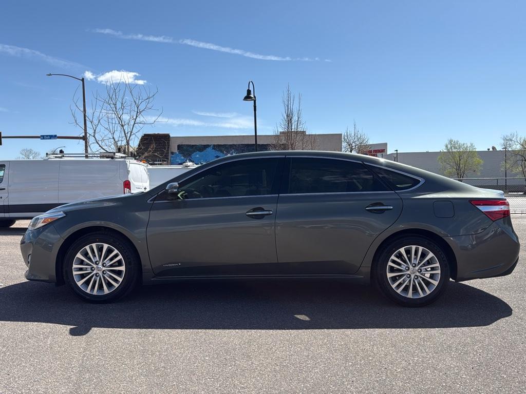 2013 GREEN Toyota Avalon Hybrid XLE TOURING (4T1BD1EB4DU) with an 4 Cyl, 2.5L engine, Automatic transmission, located at 10890 W. Colfax Ave., Lakewood, CO, 80215, (303) 274-7692, 39.739914, -105.120132 - For sale: a meticulously maintained 2013 Toyota Avalon Hybrid XLE Touring that combines luxury, efficiency, and reliability. This sophisticated sedan features a robust 4-cylinder, 2.5L engine paired with front-wheel drive, offering an impressive blend of power and fuel economy. The Avalons hybrid te - Photo#7