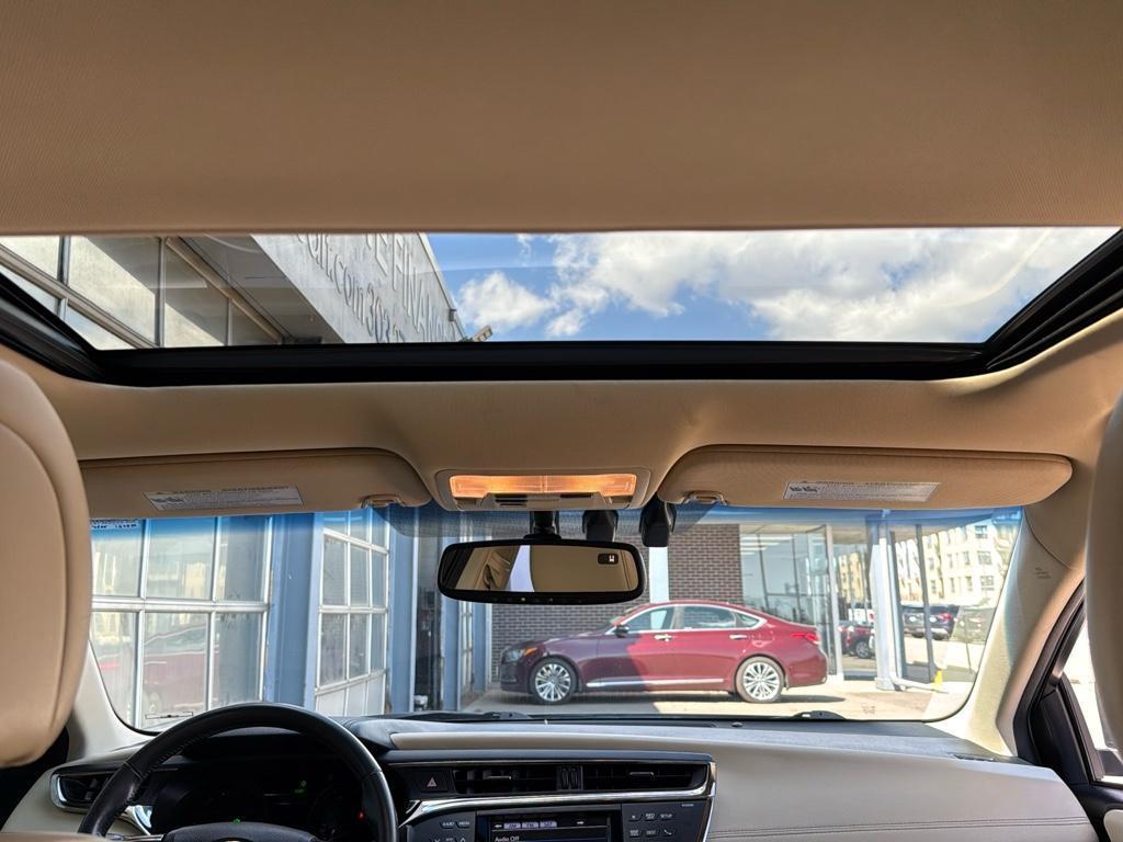 2013 GREEN Toyota Avalon Hybrid XLE TOURING (4T1BD1EB4DU) with an 4 Cyl, 2.5L engine, Automatic transmission, located at 10890 W. Colfax Ave., Lakewood, CO, 80215, (303) 274-7692, 39.739914, -105.120132 - For sale: a meticulously maintained 2013 Toyota Avalon Hybrid XLE Touring that combines luxury, efficiency, and reliability. This sophisticated sedan features a robust 4-cylinder, 2.5L engine paired with front-wheel drive, offering an impressive blend of power and fuel economy. The Avalons hybrid te - Photo#20