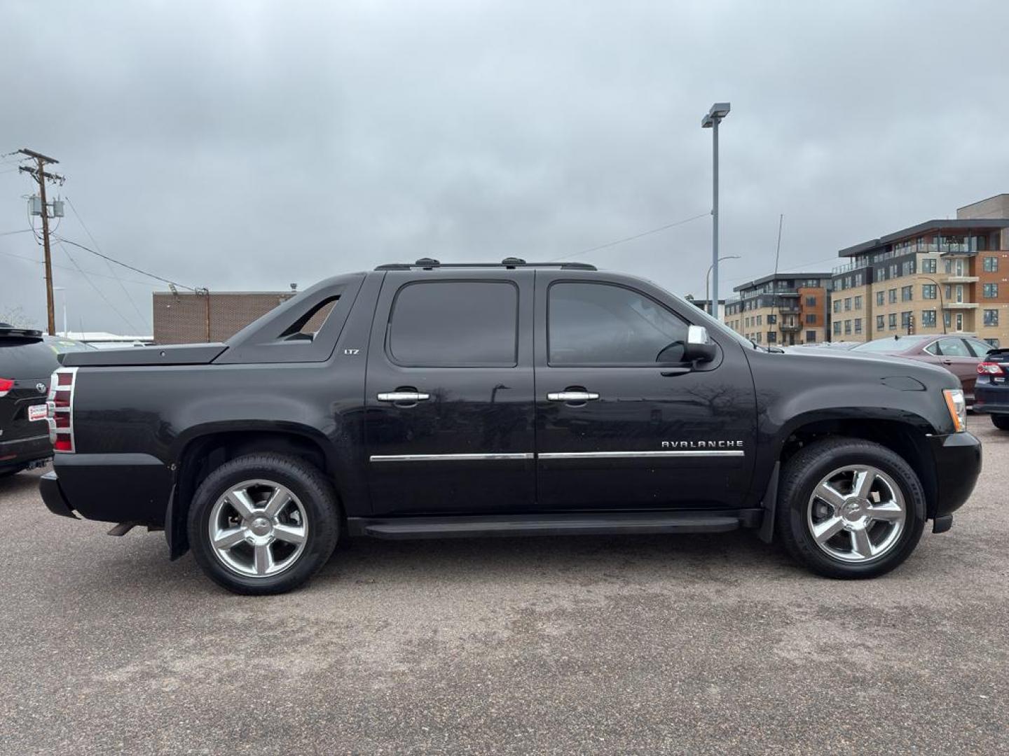 2011 BLACK Chevrolet Avalanche LTZ (3GNTKGE34BG) with an V8, 5.3L engine, Automatic transmission, located at 10890 W. Colfax Ave., Lakewood, CO, 80215, (303) 274-7692, 39.739914, -105.120132 - Photo#3