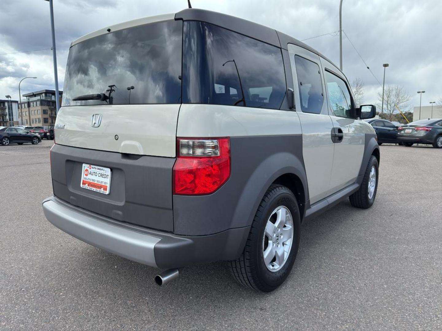 2005 TAN Honda Element EX (5J6YH28685L) with an 4 Cyl, 2.4L engine, Automatic transmission, located at 10890 W. Colfax Ave., Lakewood, CO, 80215, (303) 274-7692, 39.739914, -105.120132 - Discover the perfect blend of versatility and reliability with this 2005 Honda Element EX! A true gem for adventurers and city dwellers alike, this unique SUV stands out with its iconic boxy design and spacious interior. Powered by a robust 4-cylinder, 2.4L engine, this Honda Element delivers a smoo - Photo#4