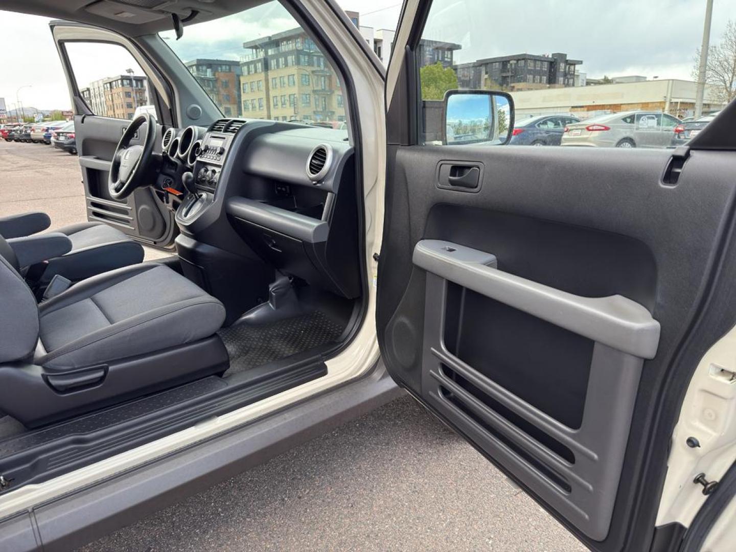 2005 TAN Honda Element EX (5J6YH28685L) with an 4 Cyl, 2.4L engine, Automatic transmission, located at 10890 W. Colfax Ave., Lakewood, CO, 80215, (303) 274-7692, 39.739914, -105.120132 - Discover the perfect blend of versatility and reliability with this 2005 Honda Element EX! A true gem for adventurers and city dwellers alike, this unique SUV stands out with its iconic boxy design and spacious interior. Powered by a robust 4-cylinder, 2.4L engine, this Honda Element delivers a smoo - Photo#8