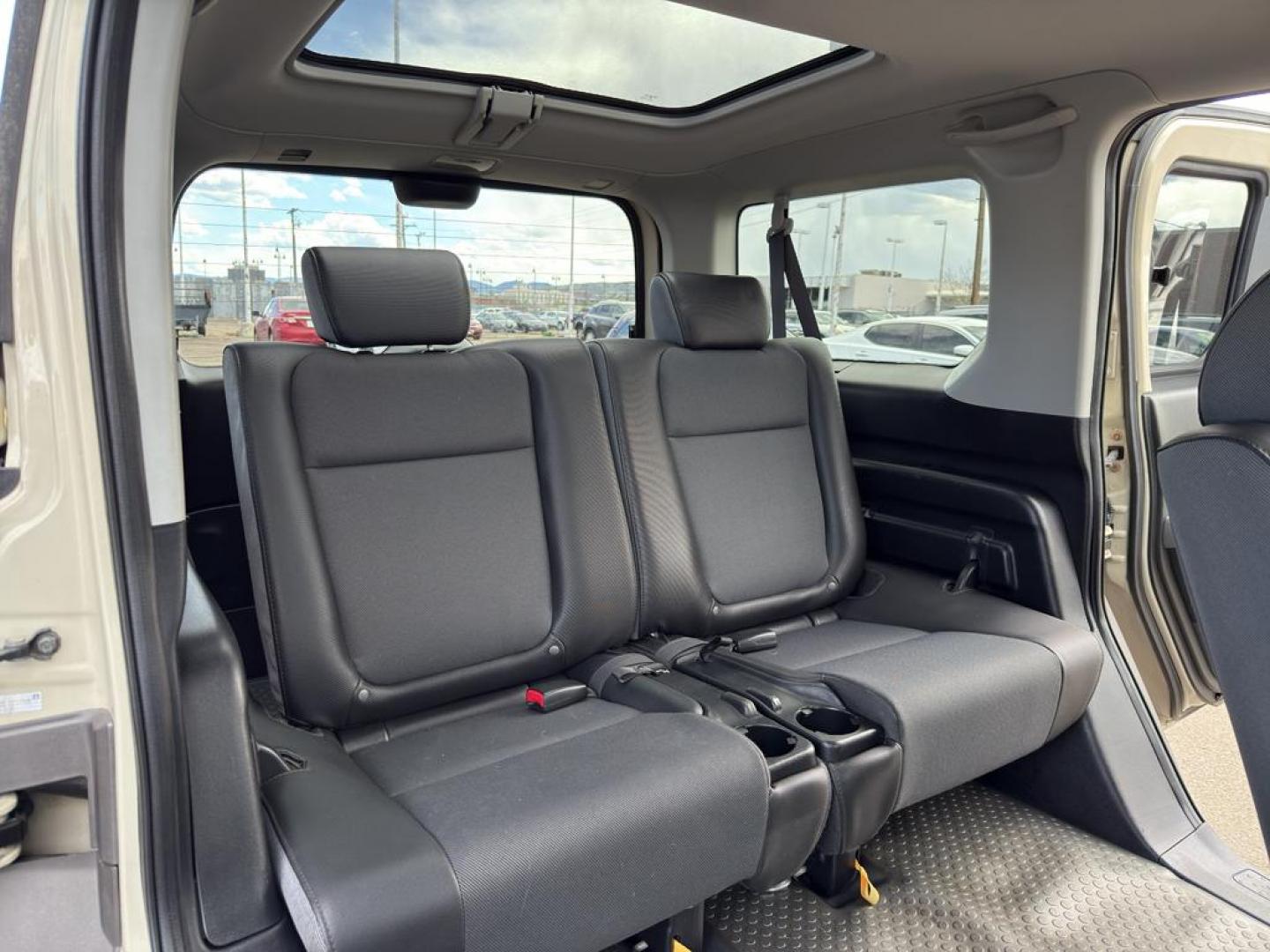 2005 TAN Honda Element EX (5J6YH28685L) with an 4 Cyl, 2.4L engine, Automatic transmission, located at 10890 W. Colfax Ave., Lakewood, CO, 80215, (303) 274-7692, 39.739914, -105.120132 - Discover the perfect blend of versatility and reliability with this 2005 Honda Element EX! A true gem for adventurers and city dwellers alike, this unique SUV stands out with its iconic boxy design and spacious interior. Powered by a robust 4-cylinder, 2.4L engine, this Honda Element delivers a smoo - Photo#10