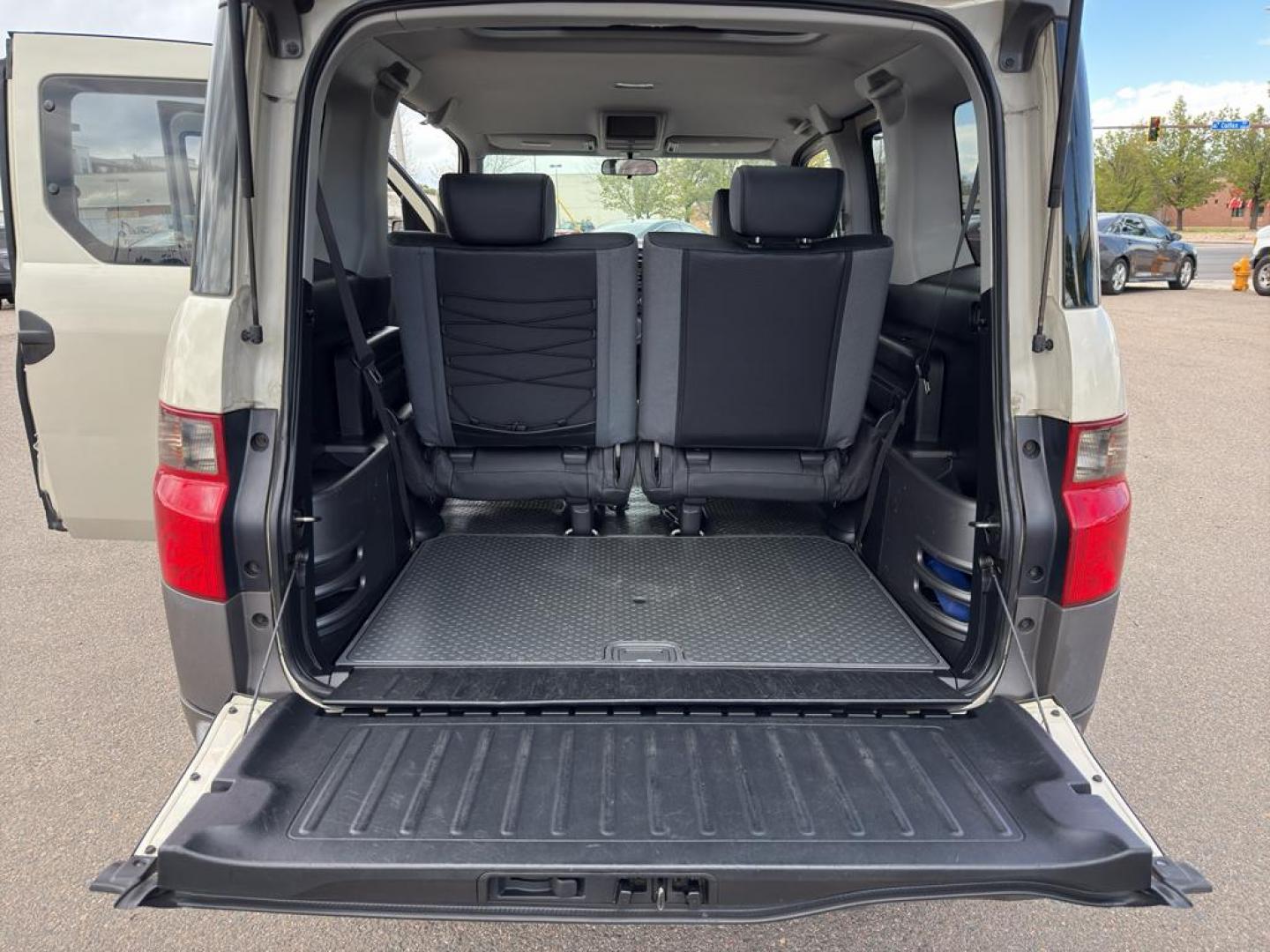 2005 TAN Honda Element EX (5J6YH28685L) with an 4 Cyl, 2.4L engine, Automatic transmission, located at 10890 W. Colfax Ave., Lakewood, CO, 80215, (303) 274-7692, 39.739914, -105.120132 - Discover the perfect blend of versatility and reliability with this 2005 Honda Element EX! A true gem for adventurers and city dwellers alike, this unique SUV stands out with its iconic boxy design and spacious interior. Powered by a robust 4-cylinder, 2.4L engine, this Honda Element delivers a smoo - Photo#11