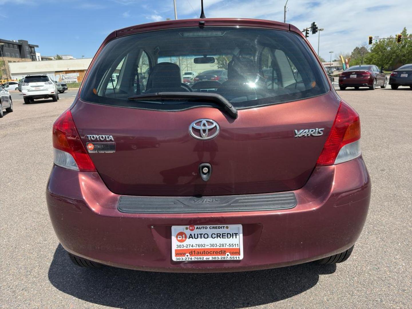 2009 RED Toyota Yaris LIFTBACK 3-DOOR AT (JTDJT903X95) with an 4 Cyl, 1.5L engine, Automatic transmission, located at 10890 W. Colfax Ave., Lakewood, CO, 80215, (303) 274-7692, 39.739914, -105.120132 - Photo#5