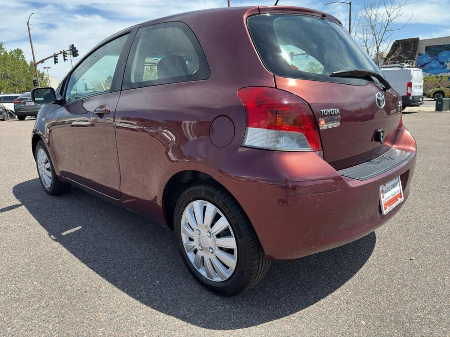 2009 RED Toyota Yaris LIFTBACK 3-DOOR AT (JTDJT903X95) with an 4 Cyl, 1.5L engine, Automatic transmission, located at 10890 W. Colfax Ave., Lakewood, CO, 80215, (303) 274-7692, 39.739914, -105.120132 - Photo#6