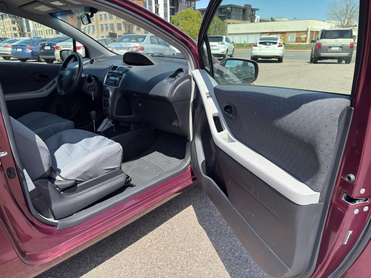 2009 RED Toyota Yaris LIFTBACK 3-DOOR AT (JTDJT903X95) with an 4 Cyl, 1.5L engine, Automatic transmission, located at 10890 W. Colfax Ave., Lakewood, CO, 80215, (303) 274-7692, 39.739914, -105.120132 - Photo#8