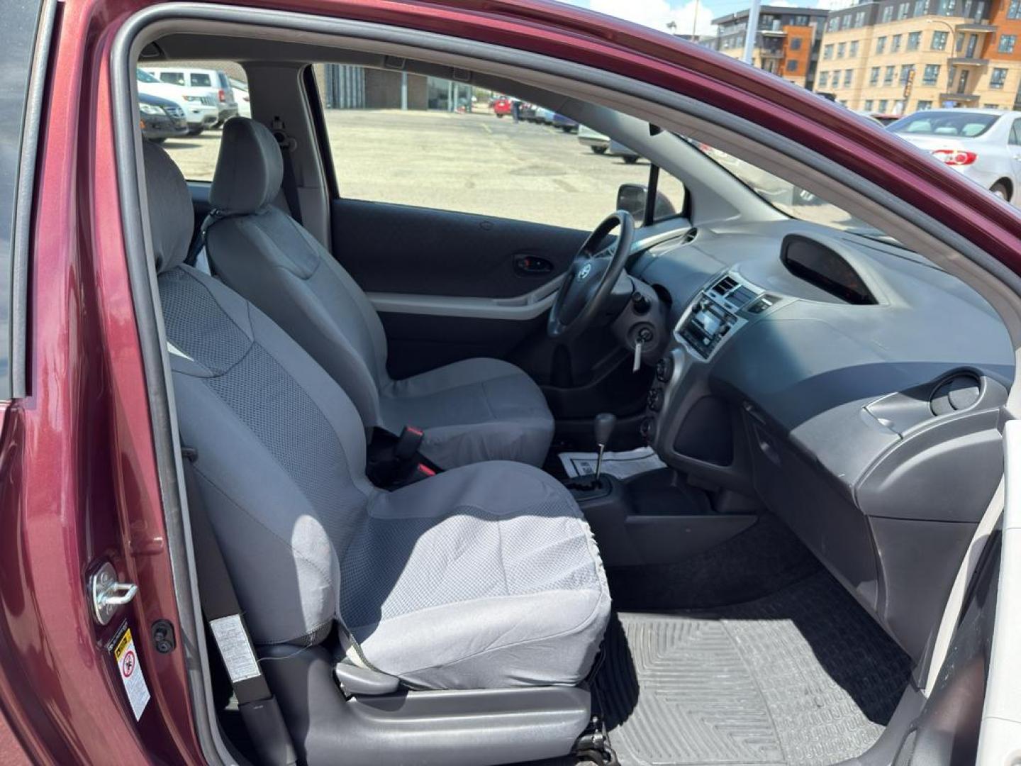 2009 RED Toyota Yaris LIFTBACK 3-DOOR AT (JTDJT903X95) with an 4 Cyl, 1.5L engine, Automatic transmission, located at 10890 W. Colfax Ave., Lakewood, CO, 80215, (303) 274-7692, 39.739914, -105.120132 - Photo#9