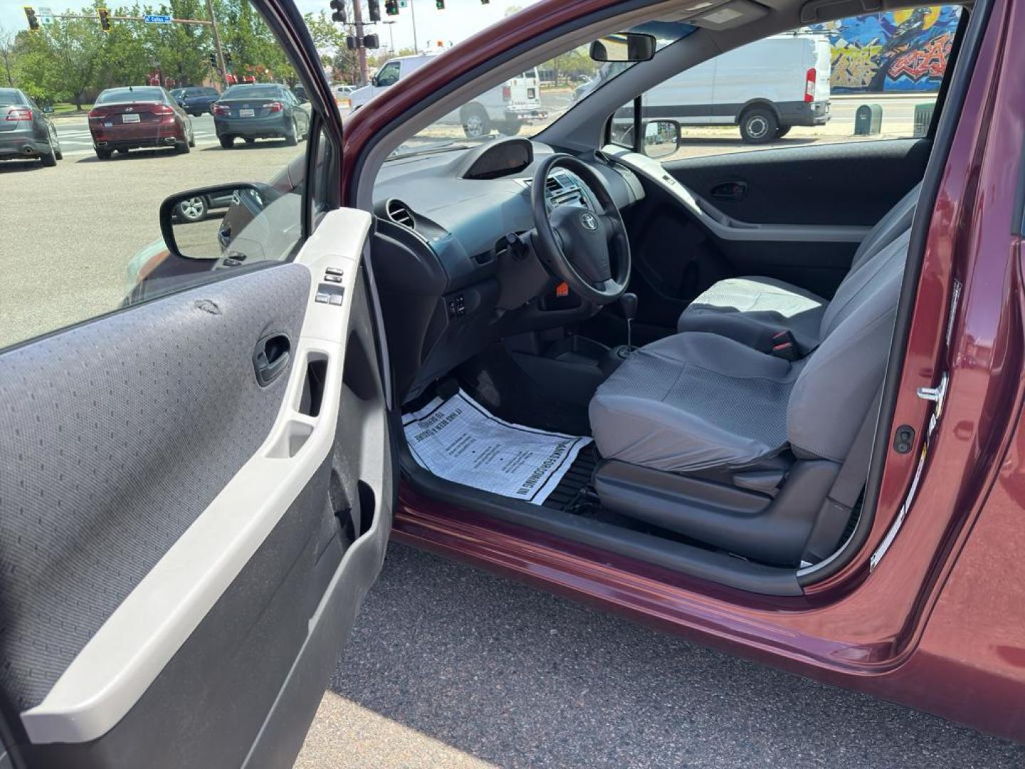 2009 RED Toyota Yaris LIFTBACK 3-DOOR AT (JTDJT903X95) with an 4 Cyl, 1.5L engine, Automatic transmission, located at 10890 W. Colfax Ave., Lakewood, CO, 80215, (303) 274-7692, 39.739914, -105.120132 - Photo#12