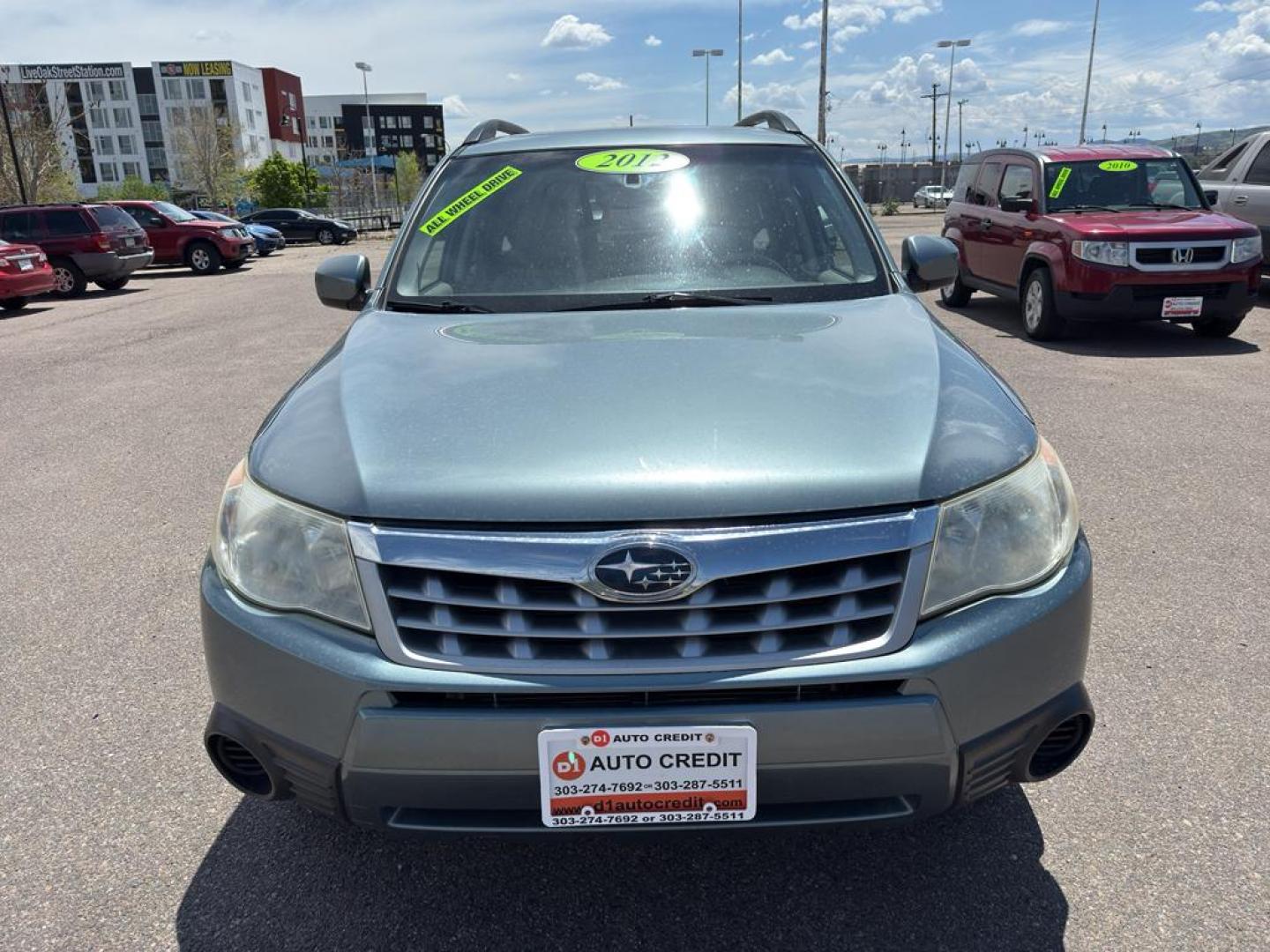 2012 GREEN Subaru Forester 2.5X Premium AWP (JF2SHADC5CH) with an 4 Cyl, 2.5L engine, Automatic transmission, located at 10890 W. Colfax Ave., Lakewood, CO, 80215, (303) 274-7692, 39.739914, -105.120132 - Discover the perfect blend of performance, comfort, and practicality with this 2012 Subaru Forester 2.5X Premium AWP! This versatile SUV is ready to accompany you on all of life's adventures, boasting Subaru's legendary All-Wheel Drive system that ensures confidence and stability, no matter the road - Photo#1