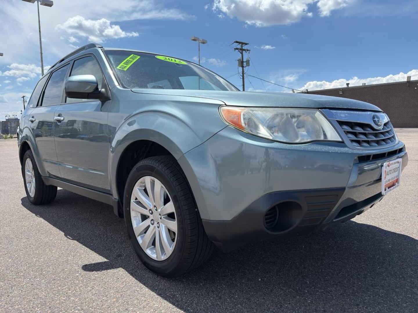 2012 GREEN Subaru Forester 2.5X Premium AWP (JF2SHADC5CH) with an 4 Cyl, 2.5L engine, Automatic transmission, located at 10890 W. Colfax Ave., Lakewood, CO, 80215, (303) 274-7692, 39.739914, -105.120132 - Discover the perfect blend of performance, comfort, and practicality with this 2012 Subaru Forester 2.5X Premium AWP! This versatile SUV is ready to accompany you on all of life's adventures, boasting Subaru's legendary All-Wheel Drive system that ensures confidence and stability, no matter the road - Photo#2