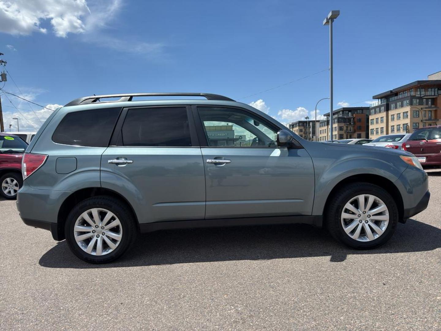 2012 GREEN Subaru Forester 2.5X Premium AWP (JF2SHADC5CH) with an 4 Cyl, 2.5L engine, Automatic transmission, located at 10890 W. Colfax Ave., Lakewood, CO, 80215, (303) 274-7692, 39.739914, -105.120132 - Discover the perfect blend of performance, comfort, and practicality with this 2012 Subaru Forester 2.5X Premium AWP! This versatile SUV is ready to accompany you on all of life's adventures, boasting Subaru's legendary All-Wheel Drive system that ensures confidence and stability, no matter the road - Photo#3