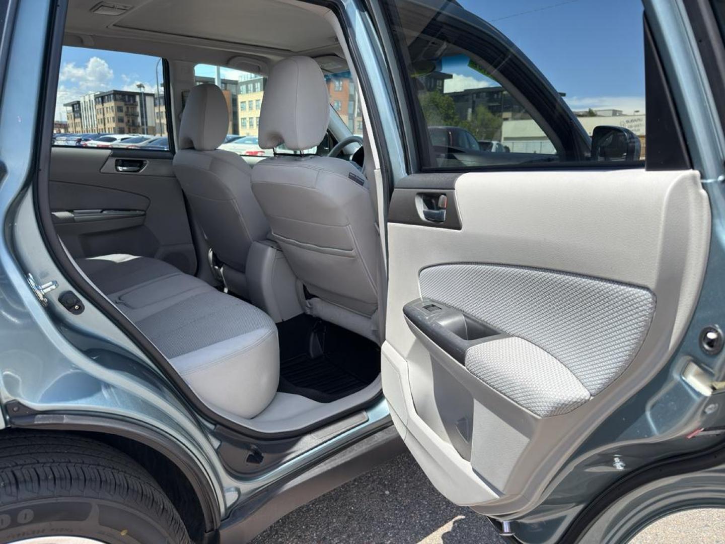 2012 GREEN Subaru Forester 2.5X Premium AWP (JF2SHADC5CH) with an 4 Cyl, 2.5L engine, Automatic transmission, located at 10890 W. Colfax Ave., Lakewood, CO, 80215, (303) 274-7692, 39.739914, -105.120132 - Discover the perfect blend of performance, comfort, and practicality with this 2012 Subaru Forester 2.5X Premium AWP! This versatile SUV is ready to accompany you on all of life's adventures, boasting Subaru's legendary All-Wheel Drive system that ensures confidence and stability, no matter the road - Photo#10