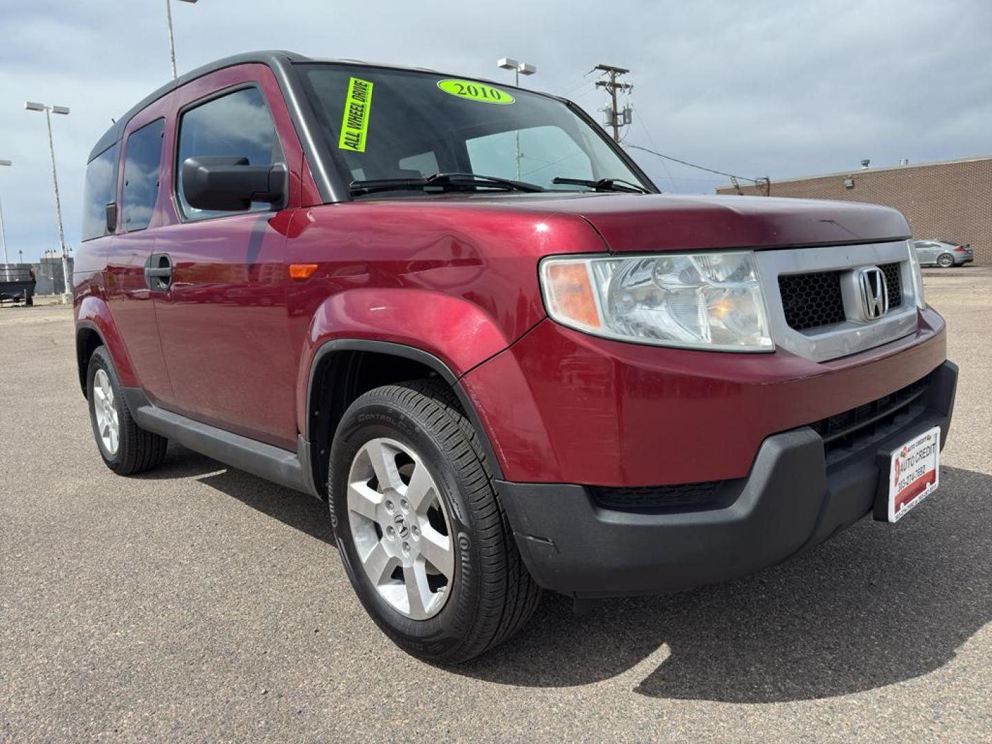 2010 RED Honda Element EX (5J6YH2H76AL) with an 4 Cyl, 2.4L engine, Automatic transmission, located at 10890 W. Colfax Ave., Lakewood, CO, 80215, (303) 274-7692, 39.739914, -105.120132 - Discover the perfect blend of style, versatility, and reliability with this exceptional 2010 Honda Element EX, a beloved compact SUV that promises to enhance your driving experience. This sturdy vehicle is equipped with a robust 4-cylinder, 2.4L engine, ensuring a smooth and efficient ride whether y - Photo#2