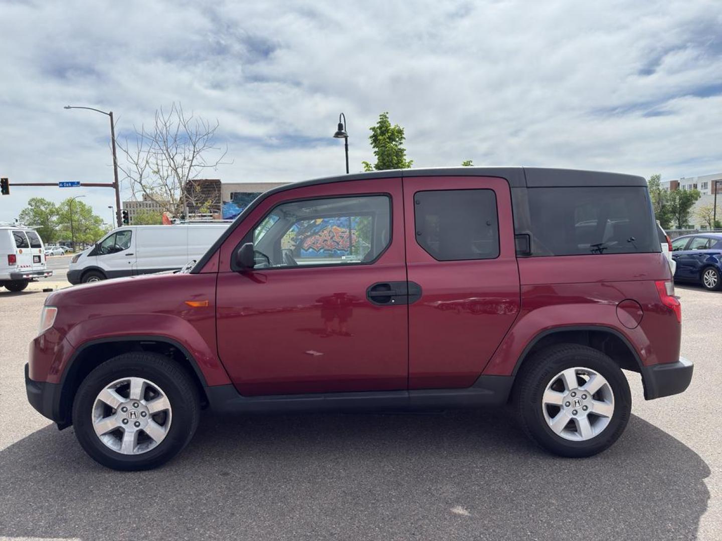 2010 RED Honda Element EX (5J6YH2H76AL) with an 4 Cyl, 2.4L engine, Automatic transmission, located at 10890 W. Colfax Ave., Lakewood, CO, 80215, (303) 274-7692, 39.739914, -105.120132 - Discover the perfect blend of style, versatility, and reliability with this exceptional 2010 Honda Element EX, a beloved compact SUV that promises to enhance your driving experience. This sturdy vehicle is equipped with a robust 4-cylinder, 2.4L engine, ensuring a smooth and efficient ride whether y - Photo#7