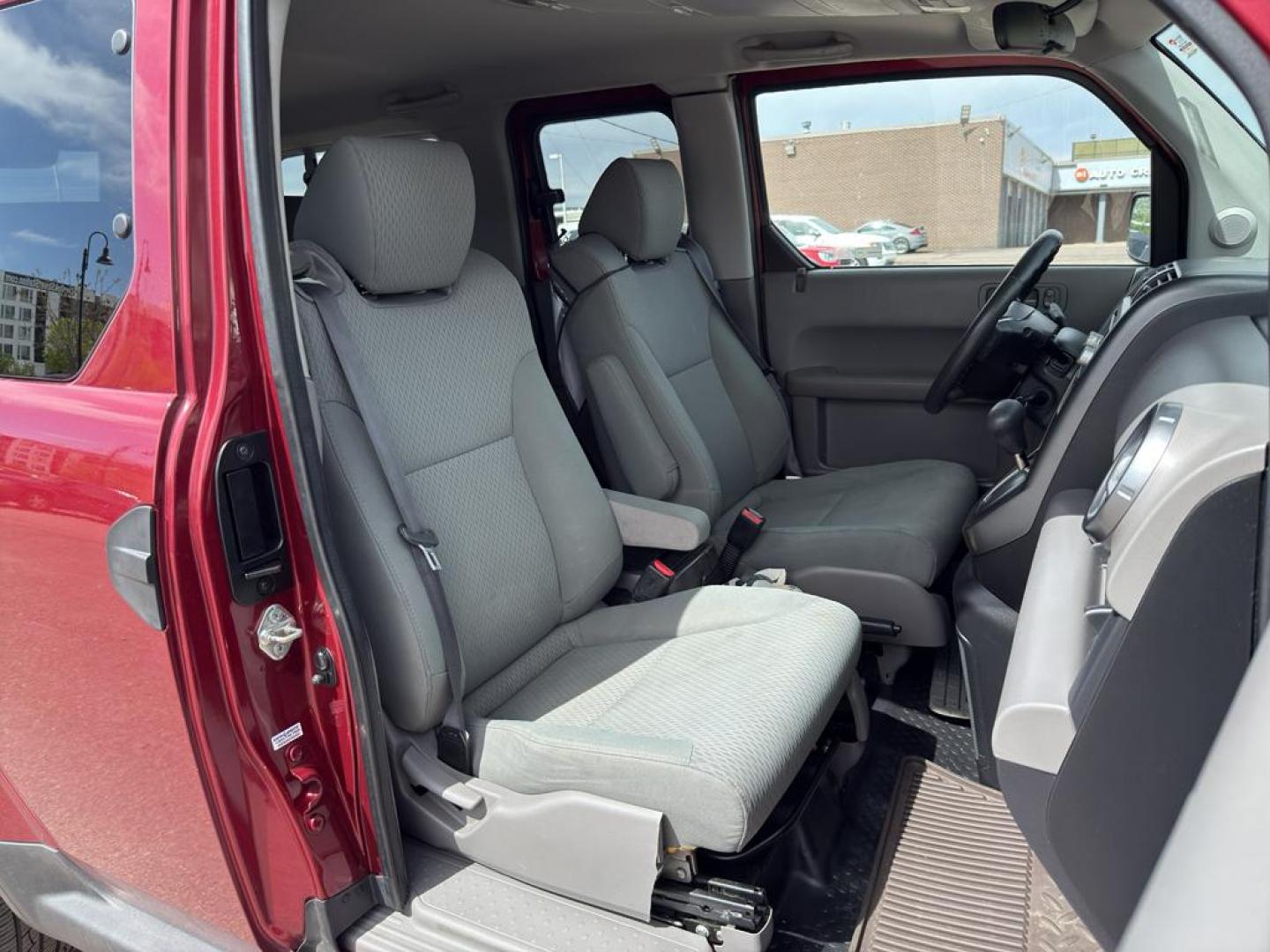 2010 RED Honda Element EX (5J6YH2H76AL) with an 4 Cyl, 2.4L engine, Automatic transmission, located at 10890 W. Colfax Ave., Lakewood, CO, 80215, (303) 274-7692, 39.739914, -105.120132 - Discover the perfect blend of style, versatility, and reliability with this exceptional 2010 Honda Element EX, a beloved compact SUV that promises to enhance your driving experience. This sturdy vehicle is equipped with a robust 4-cylinder, 2.4L engine, ensuring a smooth and efficient ride whether y - Photo#9