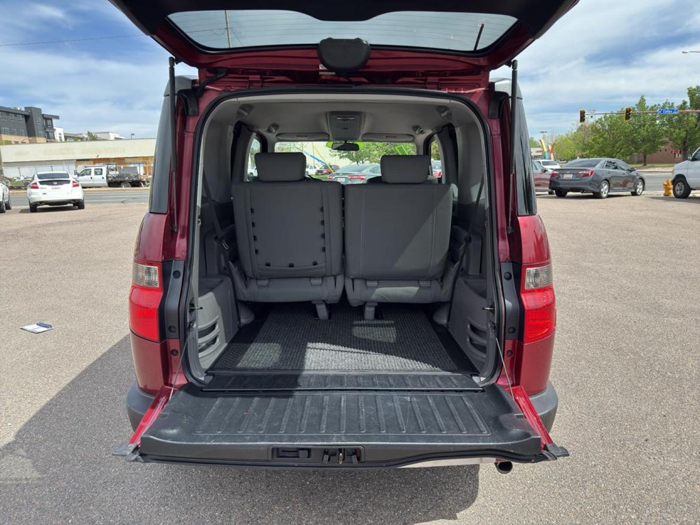 2010 RED Honda Element EX (5J6YH2H76AL) with an 4 Cyl, 2.4L engine, Automatic transmission, located at 10890 W. Colfax Ave., Lakewood, CO, 80215, (303) 274-7692, 39.739914, -105.120132 - Discover the perfect blend of style, versatility, and reliability with this exceptional 2010 Honda Element EX, a beloved compact SUV that promises to enhance your driving experience. This sturdy vehicle is equipped with a robust 4-cylinder, 2.4L engine, ensuring a smooth and efficient ride whether y - Photo#11