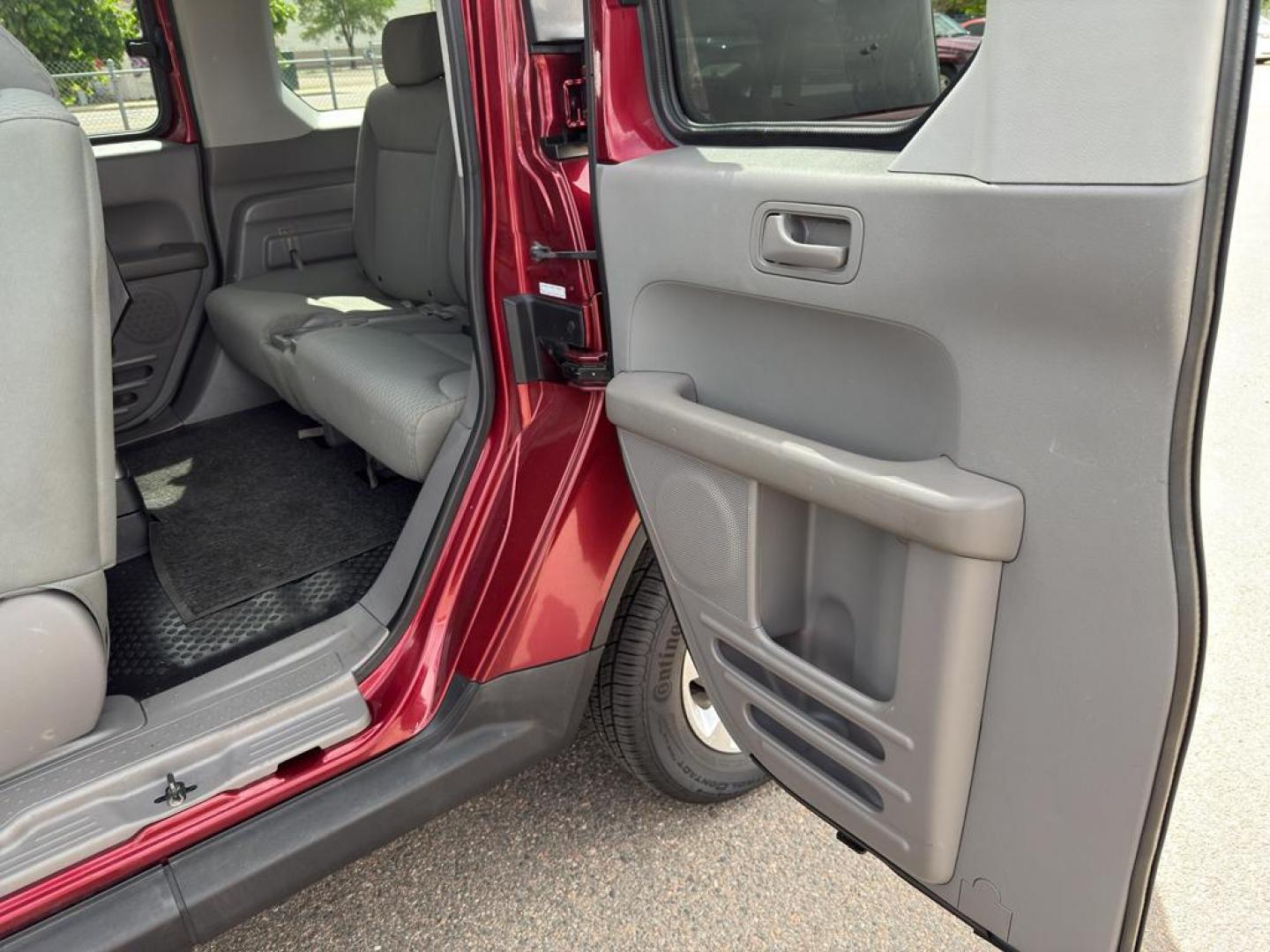 2010 RED Honda Element EX (5J6YH2H76AL) with an 4 Cyl, 2.4L engine, Automatic transmission, located at 10890 W. Colfax Ave., Lakewood, CO, 80215, (303) 274-7692, 39.739914, -105.120132 - Discover the perfect blend of style, versatility, and reliability with this exceptional 2010 Honda Element EX, a beloved compact SUV that promises to enhance your driving experience. This sturdy vehicle is equipped with a robust 4-cylinder, 2.4L engine, ensuring a smooth and efficient ride whether y - Photo#14