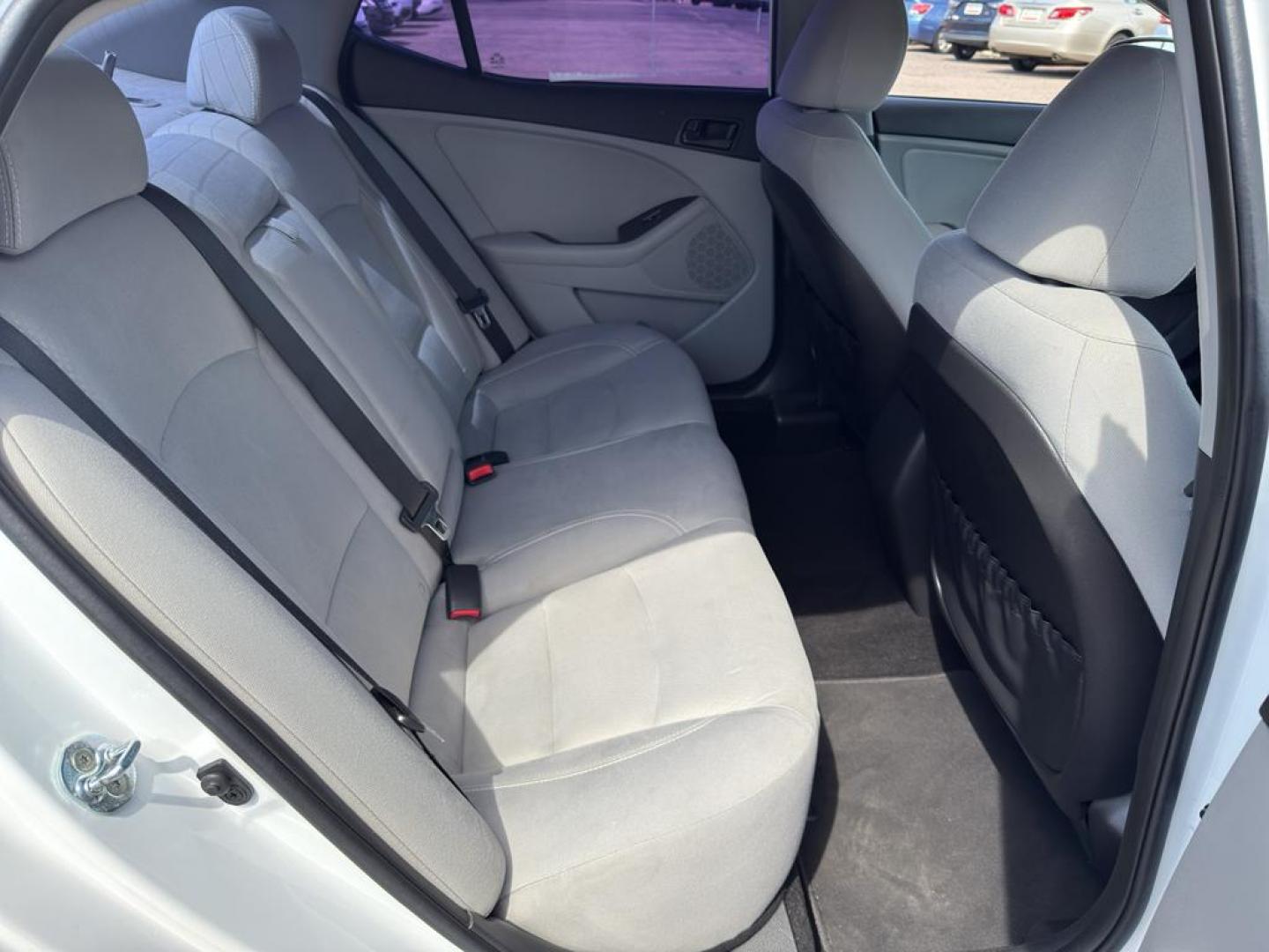 2015 WHITE Kia Optima LX (5XXGM4A71FG) with an 4 Cyl, 2.4L engine, Automatic transmission, located at 10890 W. Colfax Ave., Lakewood, CO, 80215, (303) 274-7692, 39.739914, -105.120132 - Photo#11