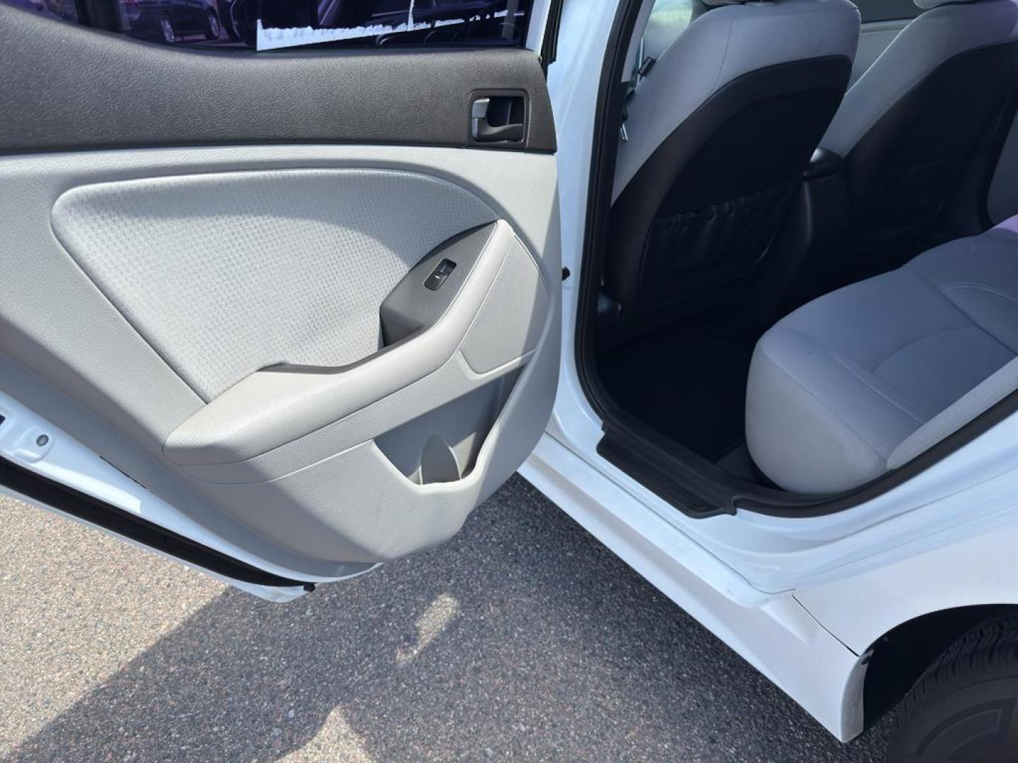 2015 WHITE Kia Optima LX (5XXGM4A71FG) with an 4 Cyl, 2.4L engine, Automatic transmission, located at 10890 W. Colfax Ave., Lakewood, CO, 80215, (303) 274-7692, 39.739914, -105.120132 - Photo#13