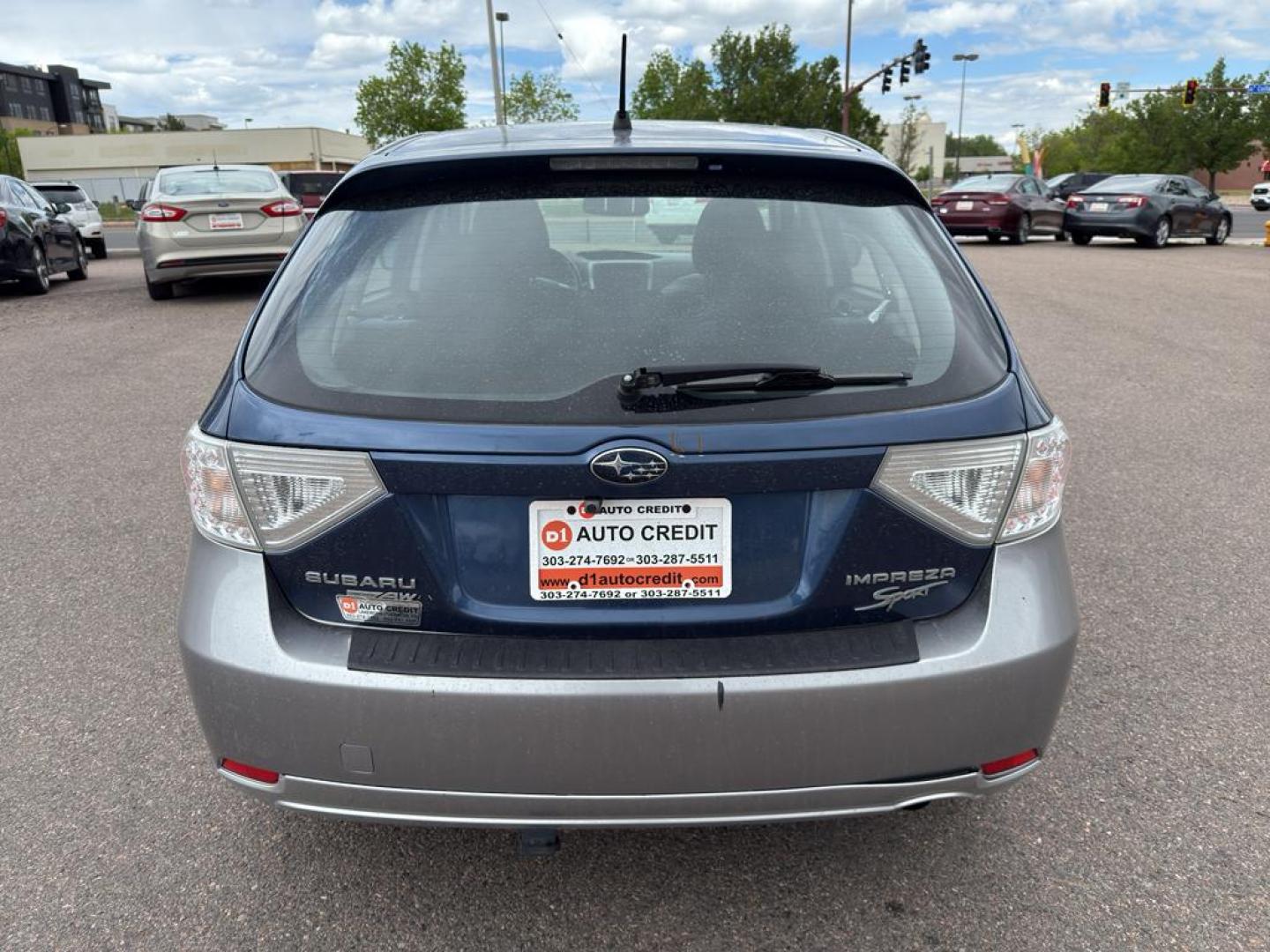 2011 BLUE Subaru Impreza Outback Sport (JF1GH6D6XBH) with an 4 Cyl, 2.5L engine, Automatic transmission, located at 10890 W. Colfax Ave., Lakewood, CO, 80215, (303) 274-7692, 39.739914, -105.120132 - Explore the exceptional versatility of the 2011 Subaru Impreza Outback Sport, an ideal choice for those seeking reliability and performance in a compact package. This well-maintained model features Subarus renowned All-Wheel Drive system, ensuring confident handling and stability in varied driving c - Photo#5