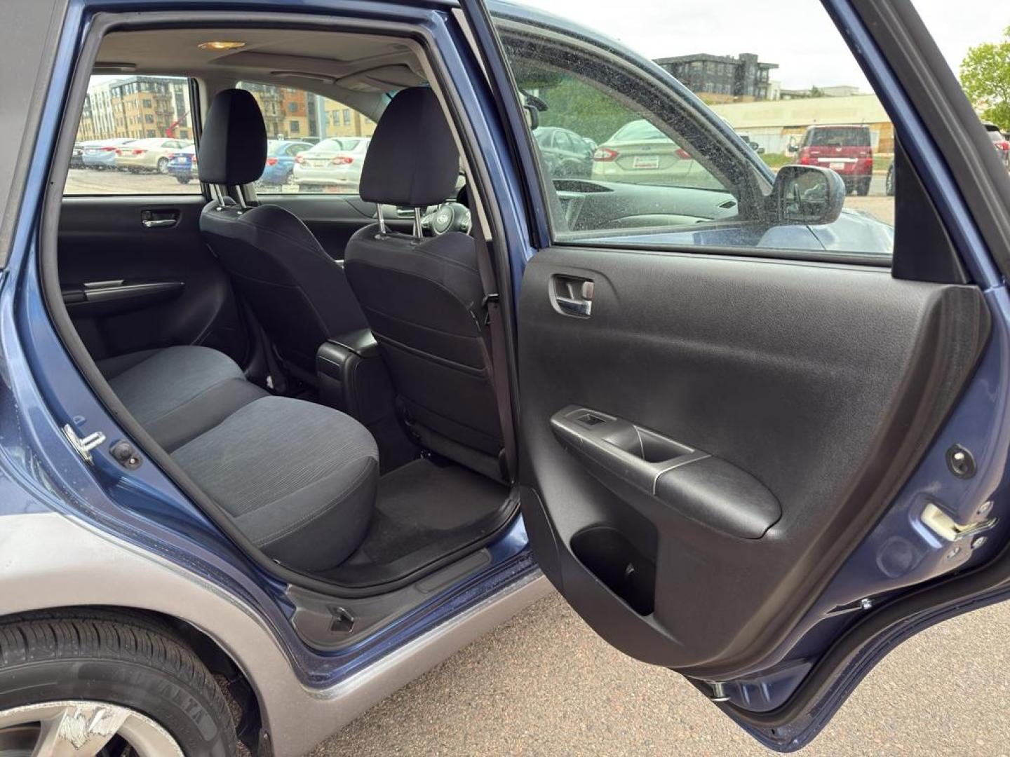 2011 BLUE Subaru Impreza Outback Sport (JF1GH6D6XBH) with an 4 Cyl, 2.5L engine, Automatic transmission, located at 10890 W. Colfax Ave., Lakewood, CO, 80215, (303) 274-7692, 39.739914, -105.120132 - Explore the exceptional versatility of the 2011 Subaru Impreza Outback Sport, an ideal choice for those seeking reliability and performance in a compact package. This well-maintained model features Subarus renowned All-Wheel Drive system, ensuring confident handling and stability in varied driving c - Photo#10