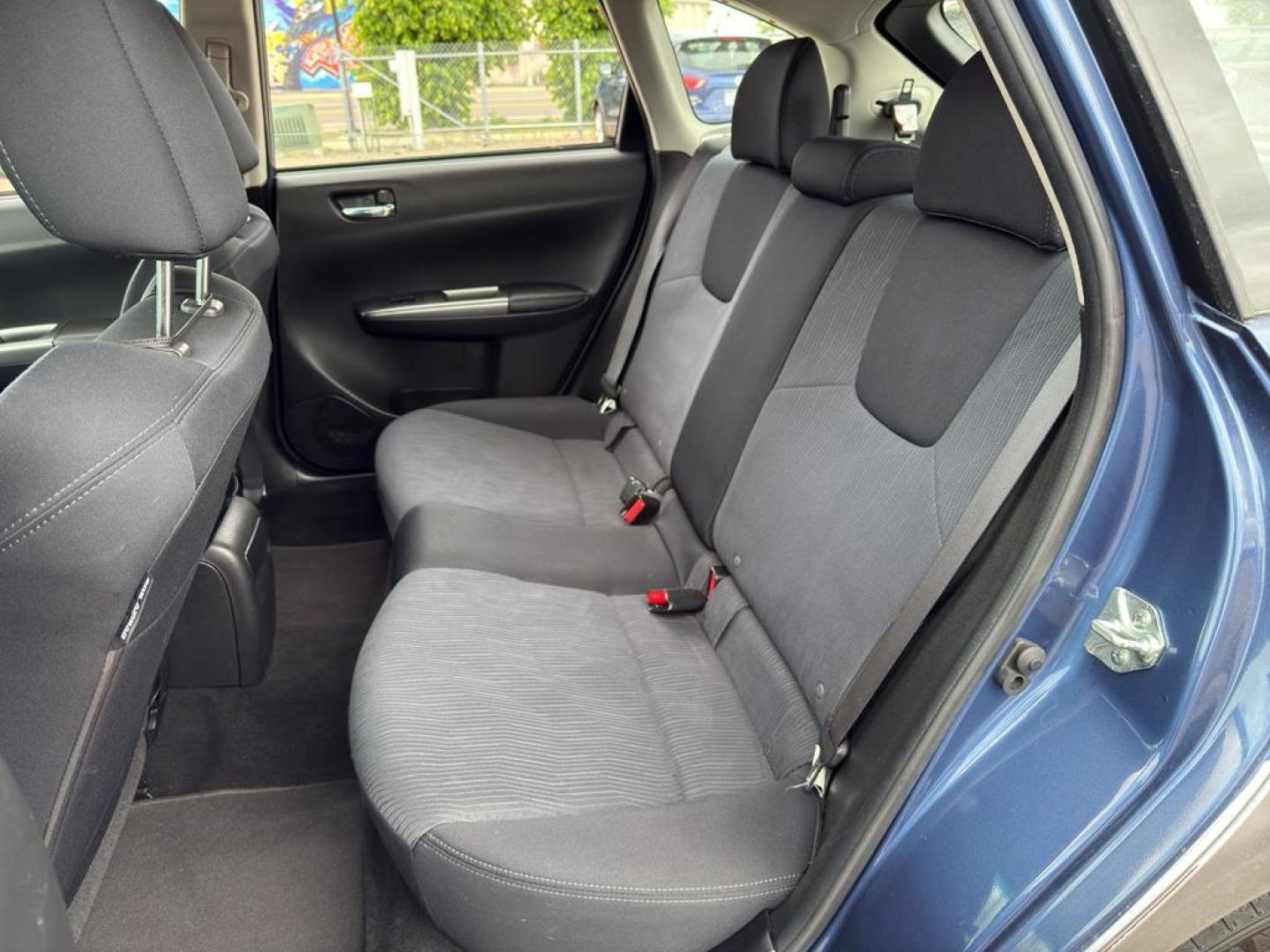 2011 BLUE Subaru Impreza Outback Sport (JF1GH6D6XBH) with an 4 Cyl, 2.5L engine, Automatic transmission, located at 10890 W. Colfax Ave., Lakewood, CO, 80215, (303) 274-7692, 39.739914, -105.120132 - Explore the exceptional versatility of the 2011 Subaru Impreza Outback Sport, an ideal choice for those seeking reliability and performance in a compact package. This well-maintained model features Subarus renowned All-Wheel Drive system, ensuring confident handling and stability in varied driving c - Photo#14