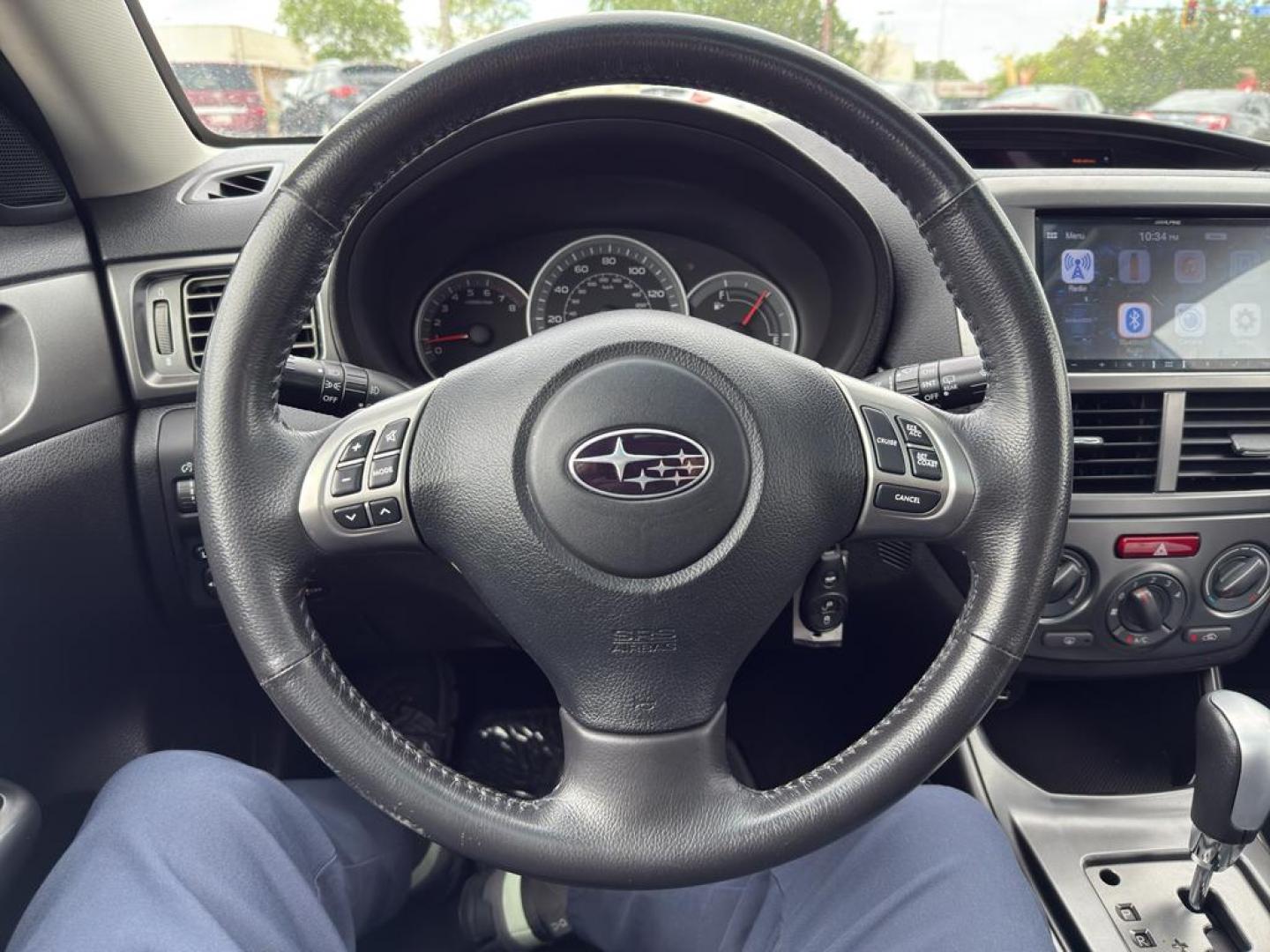 2011 BLUE Subaru Impreza Outback Sport (JF1GH6D6XBH) with an 4 Cyl, 2.5L engine, Automatic transmission, located at 10890 W. Colfax Ave., Lakewood, CO, 80215, (303) 274-7692, 39.739914, -105.120132 - Explore the exceptional versatility of the 2011 Subaru Impreza Outback Sport, an ideal choice for those seeking reliability and performance in a compact package. This well-maintained model features Subarus renowned All-Wheel Drive system, ensuring confident handling and stability in varied driving c - Photo#24