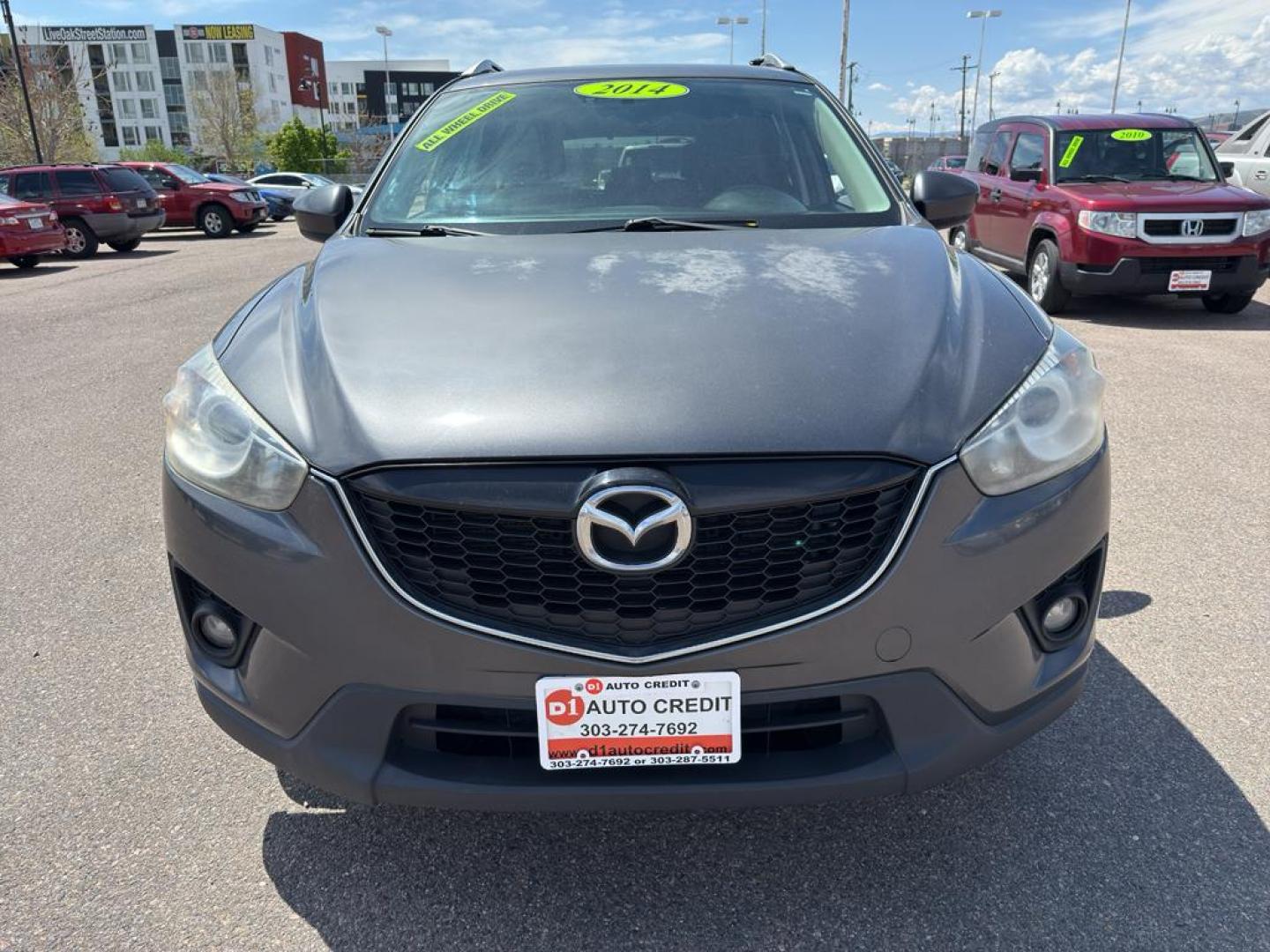 2014 GRAY Mazda CX-5 Grand Touring (JM3KE4DY4E0) with an 4 Cyl, 2.5L engine, Automatic transmission, located at 10890 W. Colfax Ave., Lakewood, CO, 80215, (303) 274-7692, 39.739914, -105.120132 - Photo#1