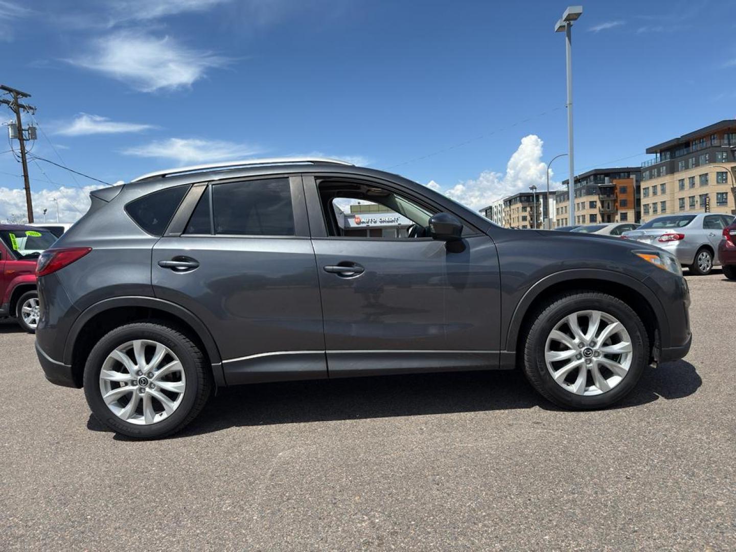 2014 GRAY Mazda CX-5 Grand Touring (JM3KE4DY4E0) with an 4 Cyl, 2.5L engine, Automatic transmission, located at 10890 W. Colfax Ave., Lakewood, CO, 80215, (303) 274-7692, 39.739914, -105.120132 - Photo#3