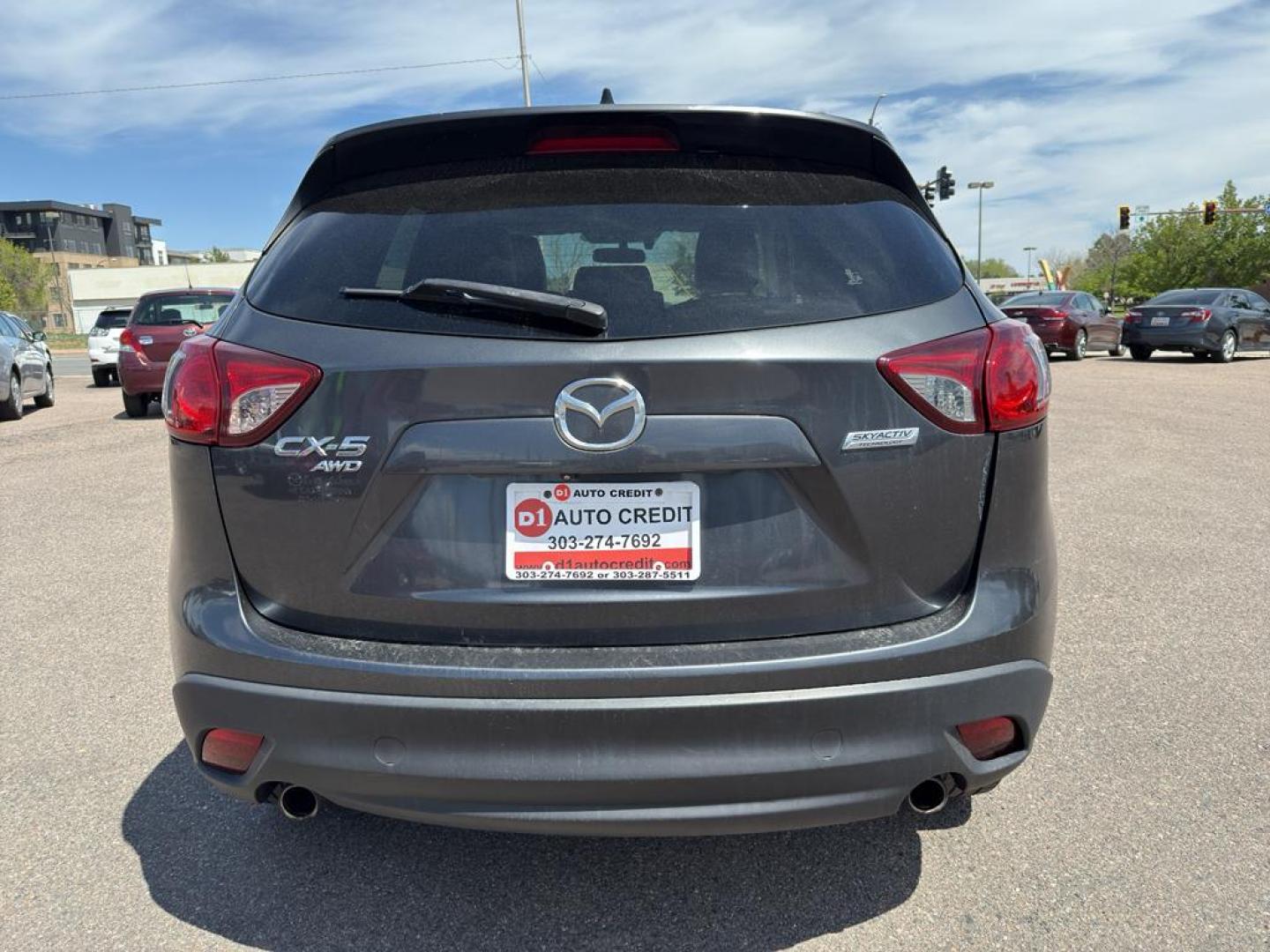 2014 GRAY Mazda CX-5 Grand Touring (JM3KE4DY4E0) with an 4 Cyl, 2.5L engine, Automatic transmission, located at 10890 W. Colfax Ave., Lakewood, CO, 80215, (303) 274-7692, 39.739914, -105.120132 - Photo#5