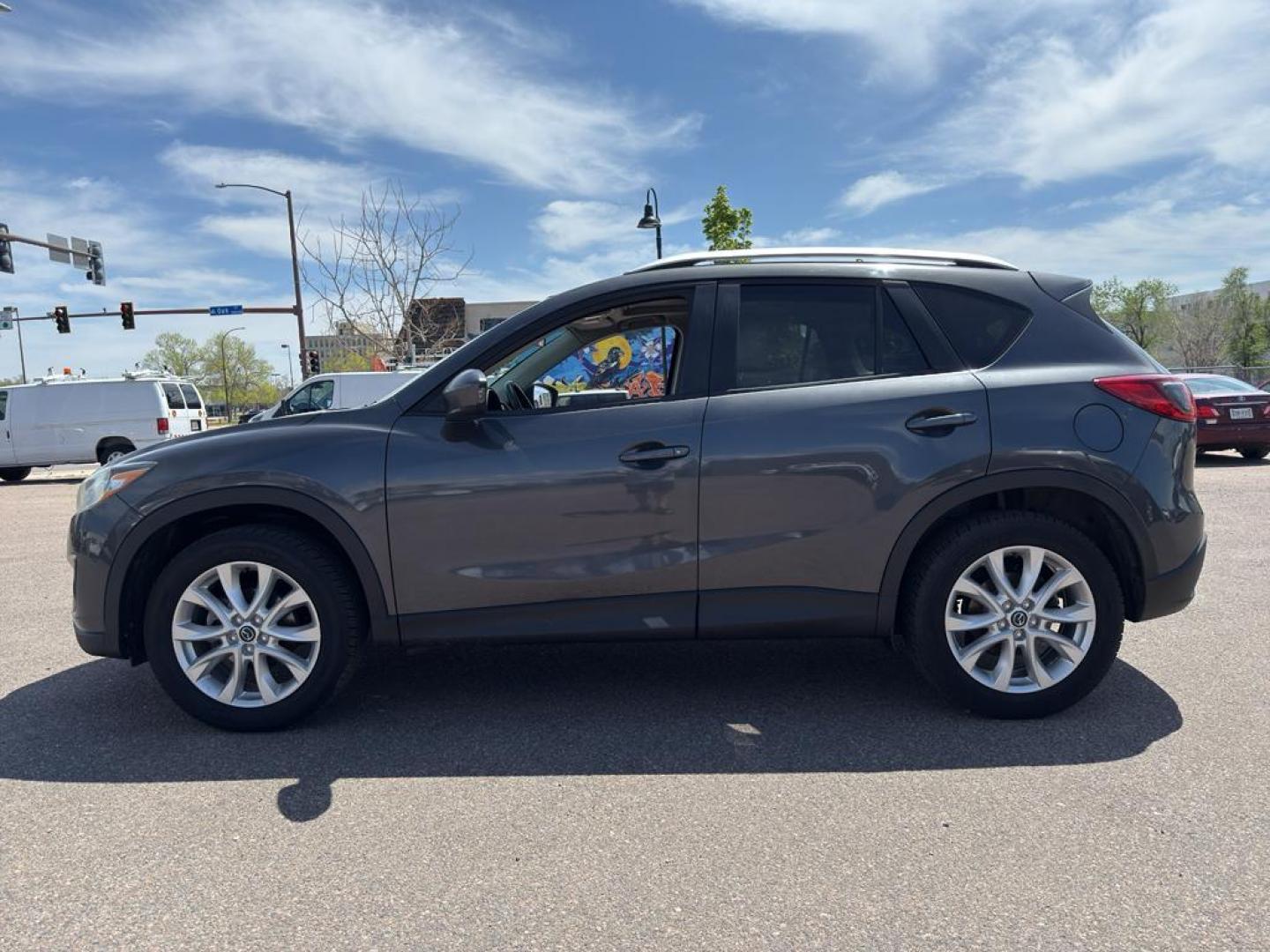 2014 GRAY Mazda CX-5 Grand Touring (JM3KE4DY4E0) with an 4 Cyl, 2.5L engine, Automatic transmission, located at 10890 W. Colfax Ave., Lakewood, CO, 80215, (303) 274-7692, 39.739914, -105.120132 - Photo#7