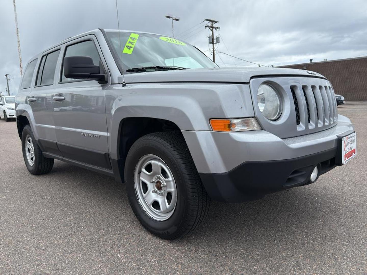 2016 SILVER Jeep Patriot Sport (1C4NJRBB0GD) with an 4 Cyl, 2.4L engine, Automatic transmission, located at 10890 W. Colfax Ave., Lakewood, CO, 80215, (303) 274-7692, 39.739914, -105.120132 - Discover the perfect blend of reliability and adventure with our 2016 Jeep Patriot Sport, now available for sale. This versatile SUV is equipped with a robust 4WD system, making it an ideal companion for both city drives and off-road adventures. Under the hood, youll find a fuel-efficient 4-cylinder - Photo#2