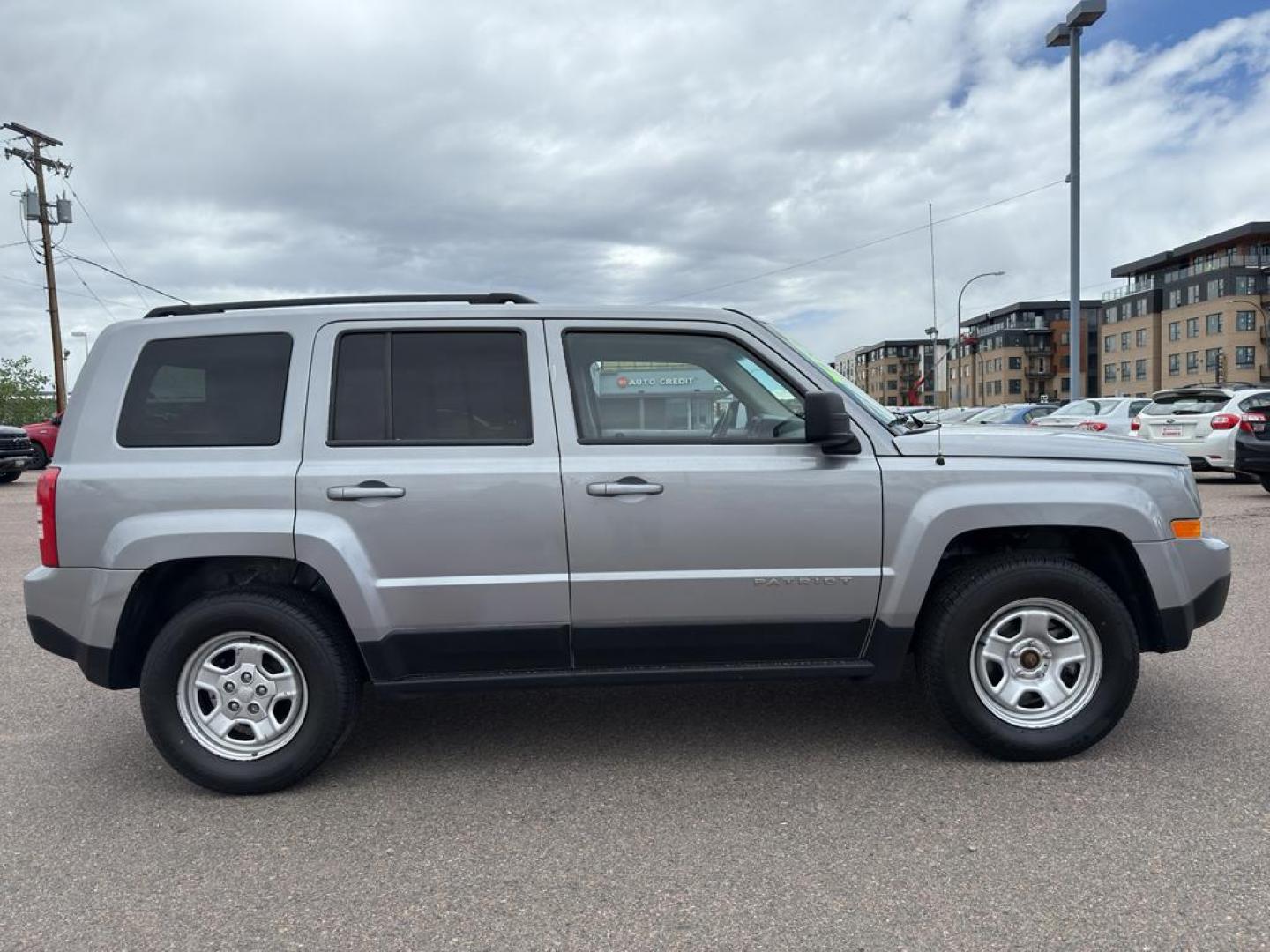2016 SILVER Jeep Patriot Sport (1C4NJRBB0GD) with an 4 Cyl, 2.4L engine, Automatic transmission, located at 10890 W. Colfax Ave., Lakewood, CO, 80215, (303) 274-7692, 39.739914, -105.120132 - Discover the perfect blend of reliability and adventure with our 2016 Jeep Patriot Sport, now available for sale. This versatile SUV is equipped with a robust 4WD system, making it an ideal companion for both city drives and off-road adventures. Under the hood, youll find a fuel-efficient 4-cylinder - Photo#3
